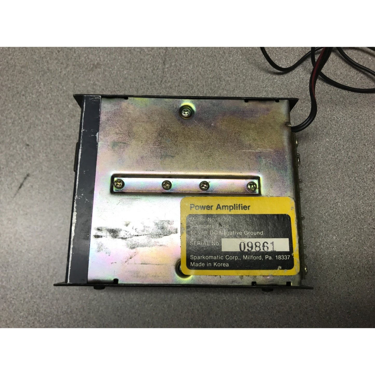 Sparkomatic Power Booster Power Amplifier LC50 5A Fuse 12V DC Negative Ground bottom of unit manufacture label