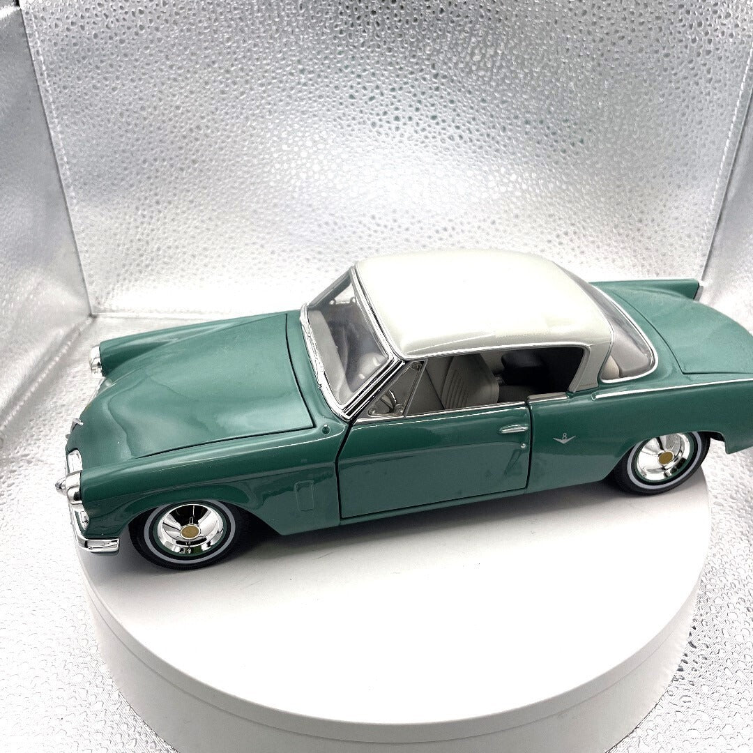 Miasto 1953 Studebaker Starliner Teal Die Cast, Scale: 1/18 11451 driver's side view