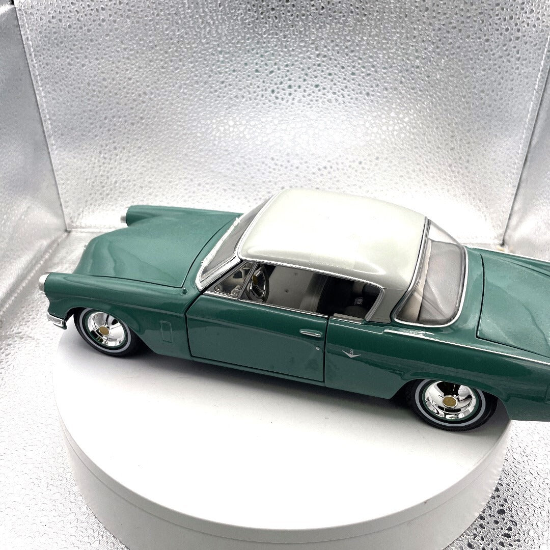 Miasto 1953 Studebaker Starliner Teal Die Cast, Scale: 1/18 11451 driver's side view