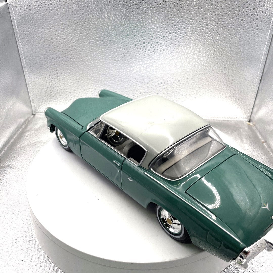 Miasto 1953 Studebaker Starliner Teal Die Cast, Scale: 1/18 11451 driver's side/rear view