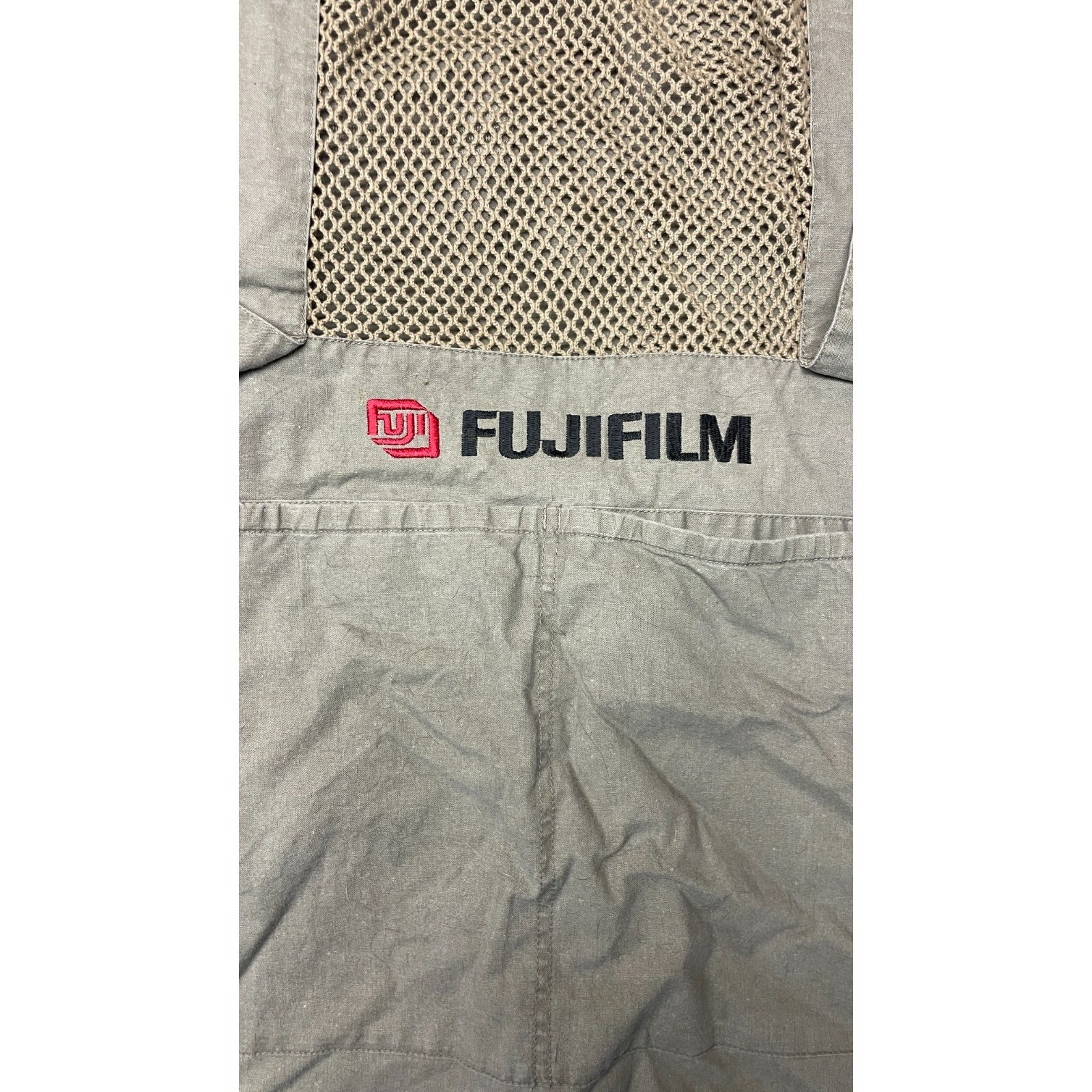 Fujifilm DOMKE PhoTOGS Photography Vest - XL closeup of back of vest pockets and Fujifilm logo