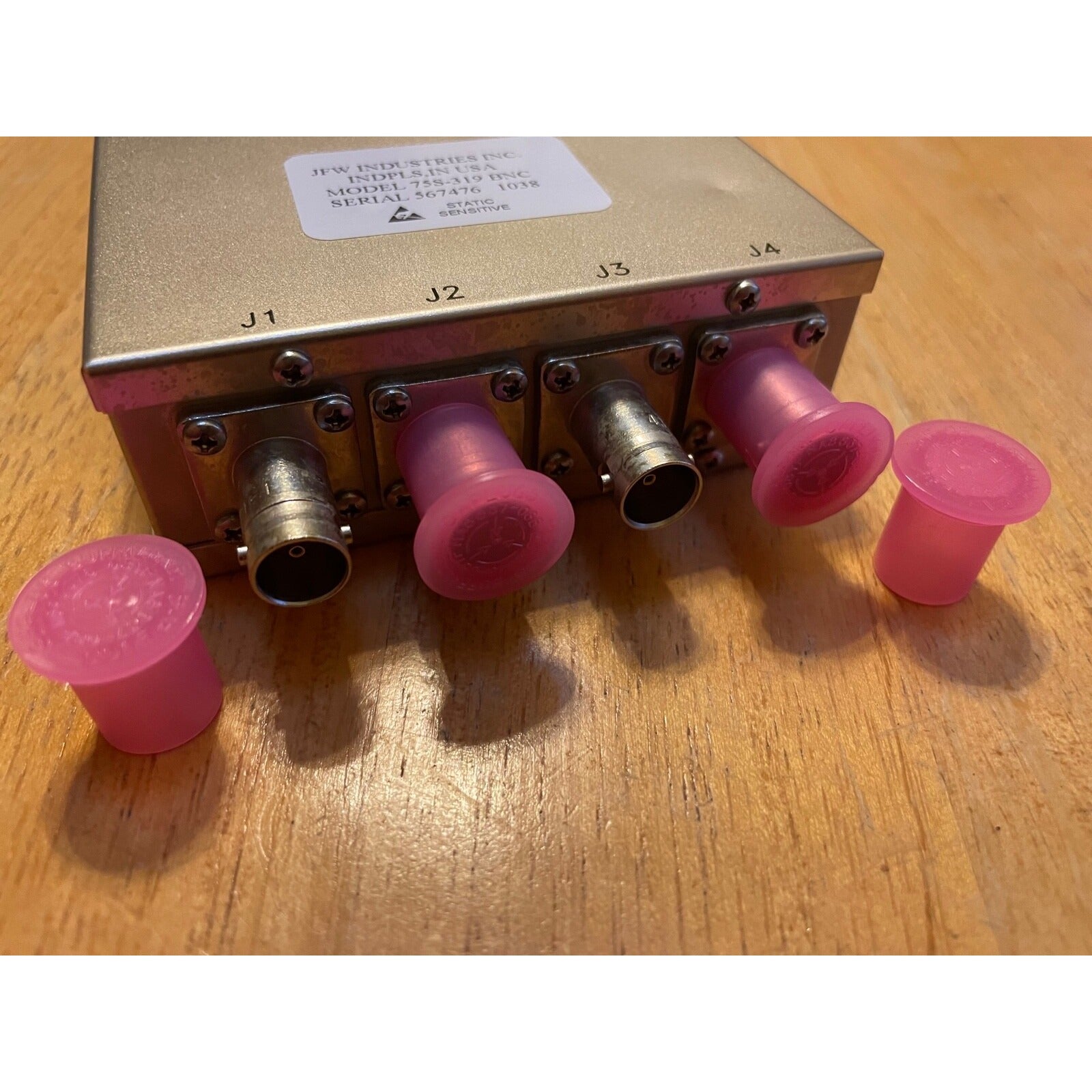 JFW Industries Inc Model 75S-319 BNC Splitter closeup of connections and caps