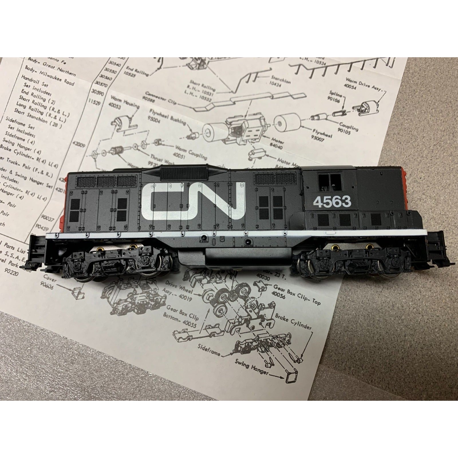 Athearn #4563 Canadian National Train Diesel Road Switcher GP-9 Power closeup of train car with parts diagram