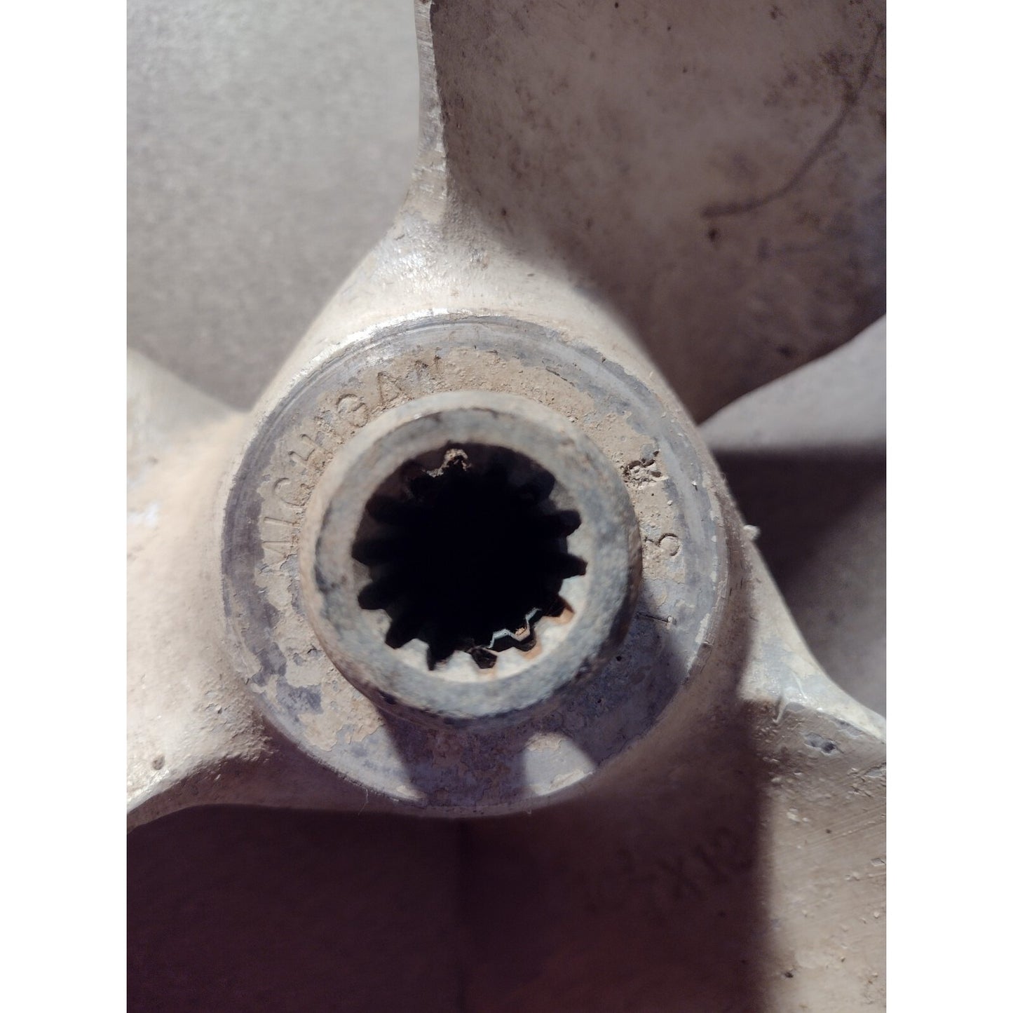Michigan 132 Prop, 10.25x12, Three Blade Boat Prop closeup of hub connector