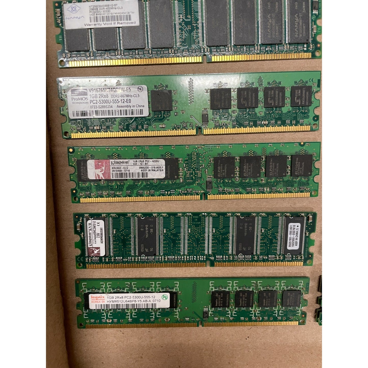 RAM Chips Included (quantity listed on the left)
4 - HYS64T128020HU-3S-B1 - Nanya 512MB1 - Parts Quick 1GB1 - Hynix 4GB1 - Nanya 256MB1 - ProMOS Technologies 1GB1 - Kingston Tech 1GB1 - Kingston Tech 2.6V1 - Hynix 1GB1 - Kingston Tech 2GB1 - Samsung 2GB1 - Mushkin 1GB1 - IBM 256MB2 - Corsair VS512MB4002 - DDR-DIMM 512MB2 - Kingston KVR667D2K2/2GR2 - ULT30215 512MB 5 types closeup