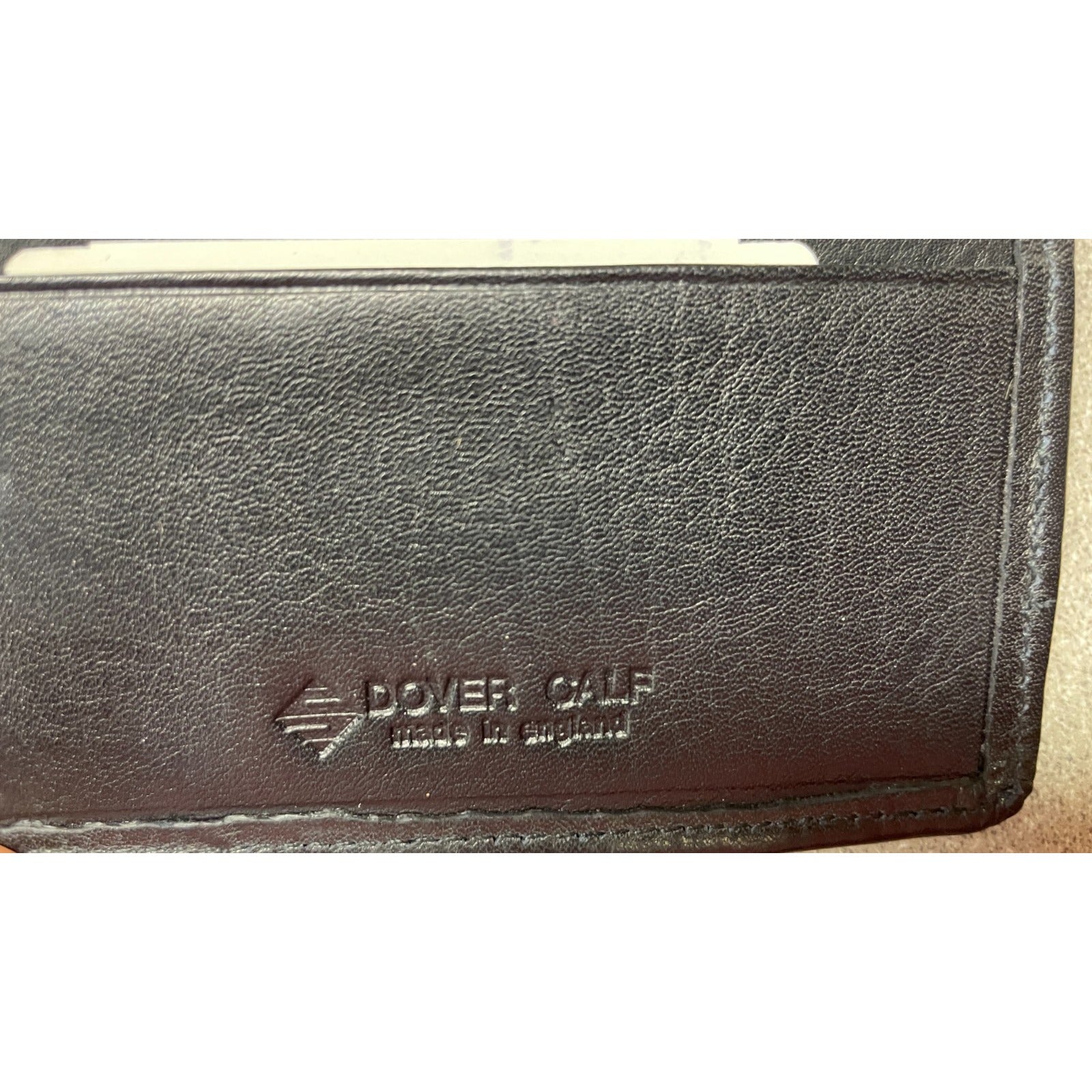 Stanley of England Black Dover Calf Leather Wallet closeup of manufacturers stamp 