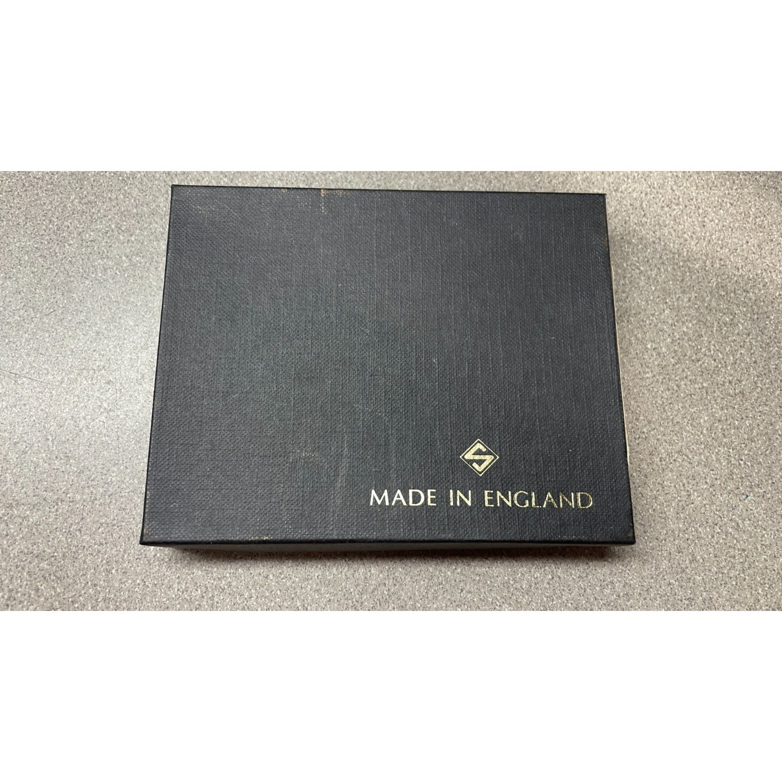 Stanley of England Black Dover Calf Leather Wallet front of box with made in England stamp and logo