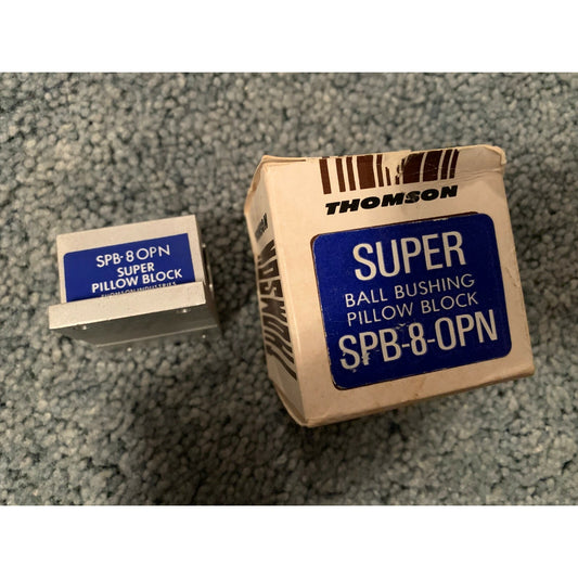 Thomson Industries SPB-8-OPN Super Ball Bushing Pillow Block side view of block with box