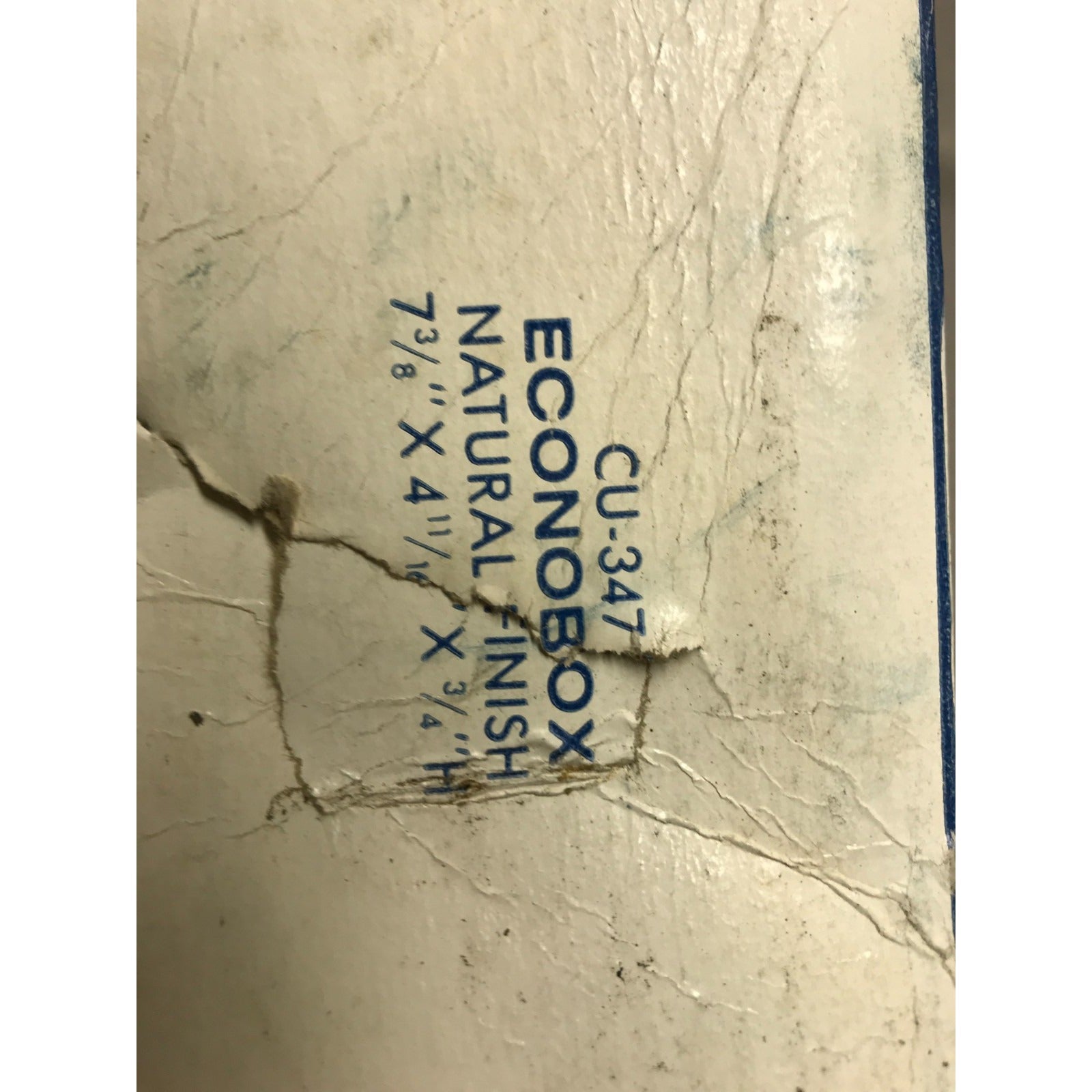 Econobox CU-347 natural finish product with visible wear and tear on a white background