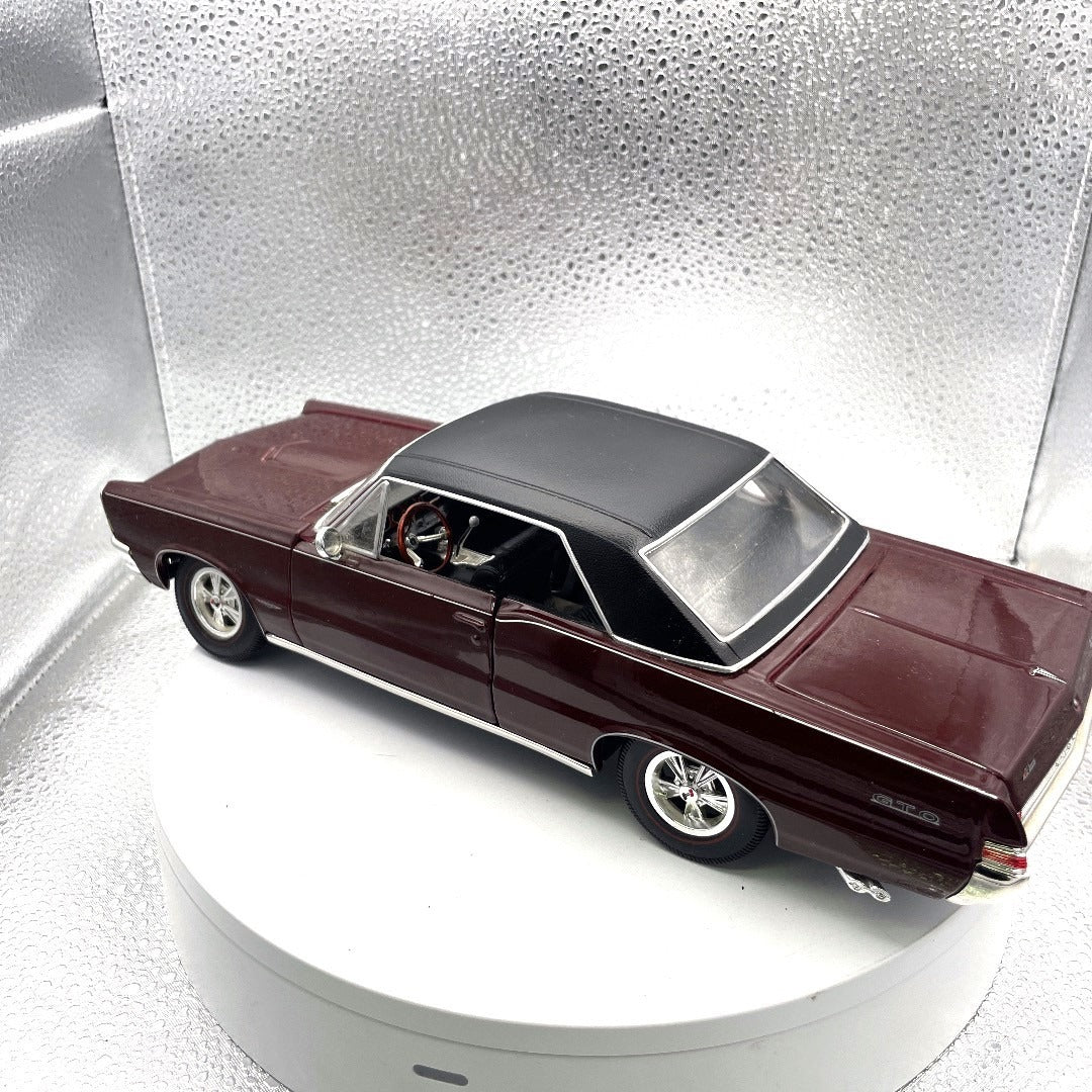 Maisto 1965 Pontiac GTO Special Edition Maroon Die Cast, Scale: 1/18 drivers side view