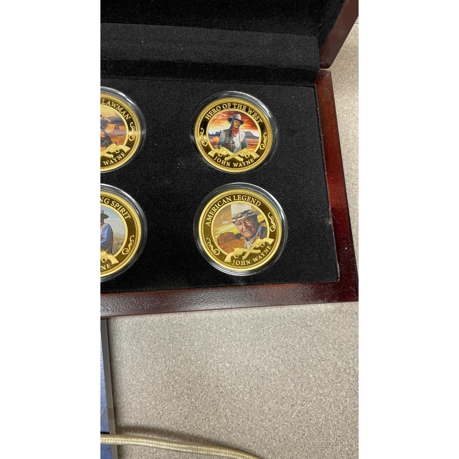 Bradford Exchange John Wayne Commemorative Coins and Collection Case closeup of coins in case, hero of the west and American legend