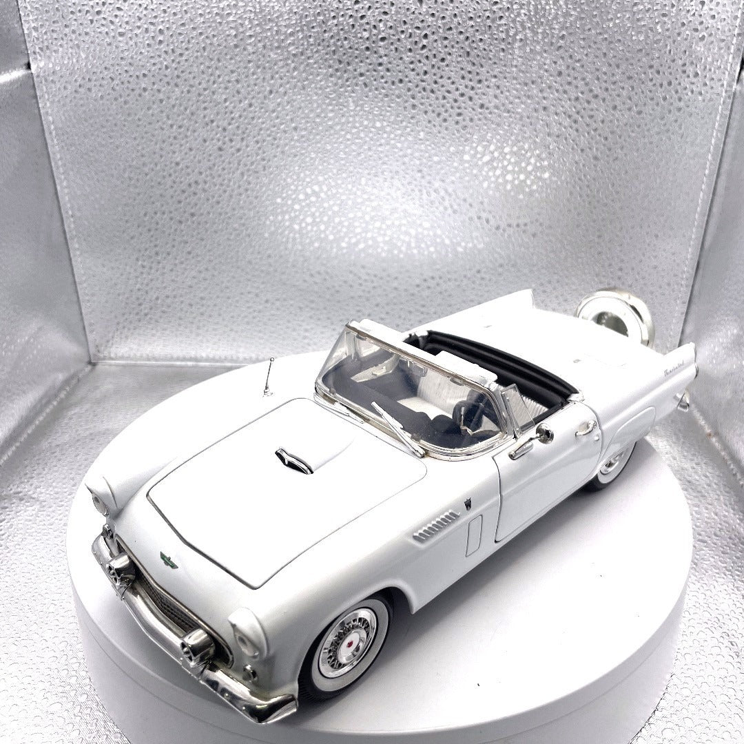Motor Max 1956 Ford Thunderbird White Die Cast Convertible, Scale: 1/18, No. 73173 front end/drivers side view