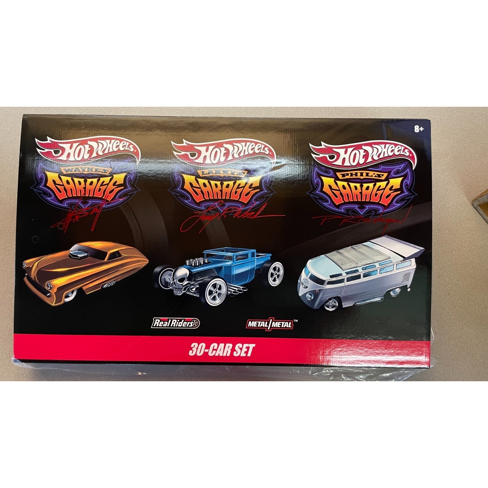 Real Riders Metal/Metal Hot Wheels 30-Car Set, Wayne Larry and Phil's Garage top of package