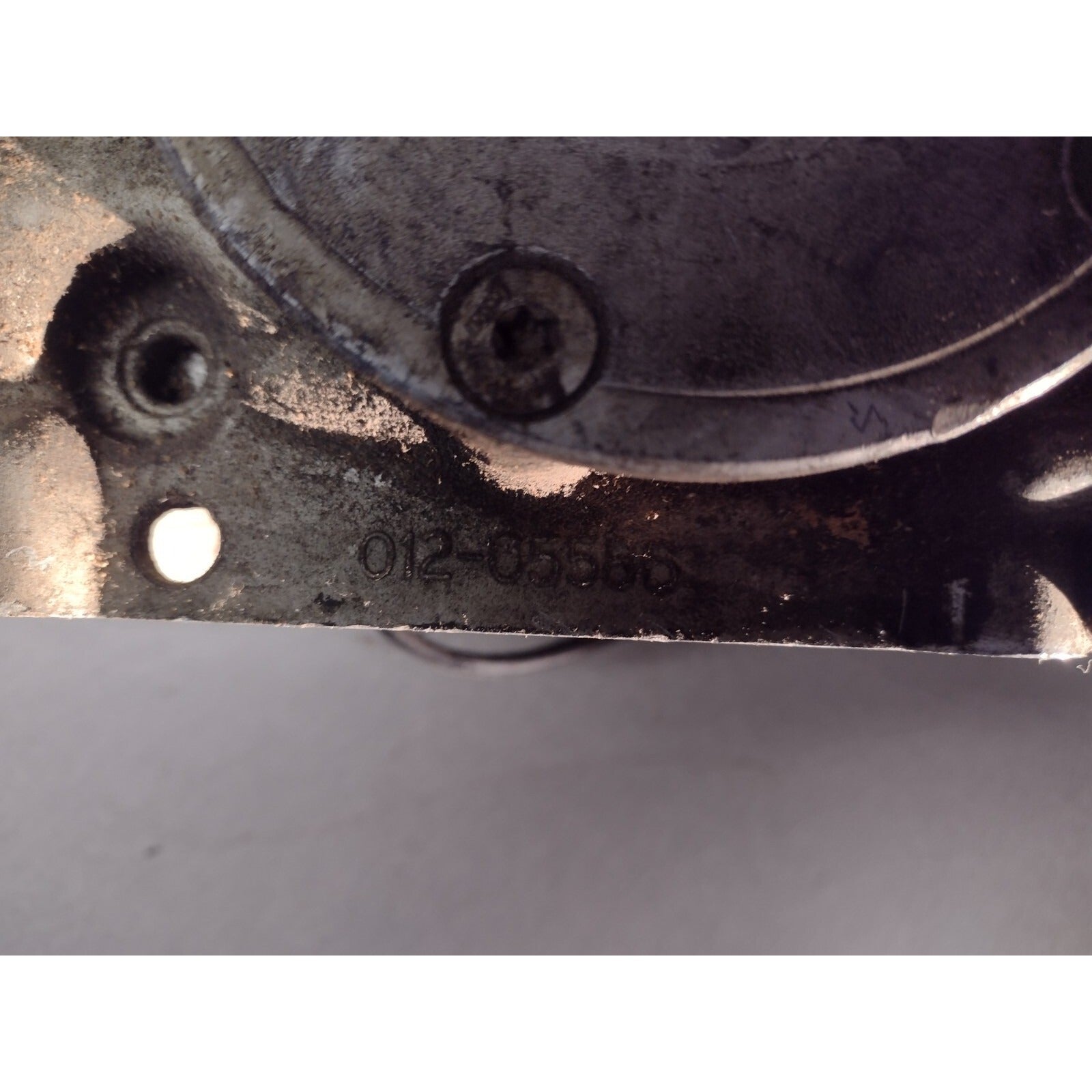 AC Compressor - Lester-6 012-05586 with bracket. bracket closeup