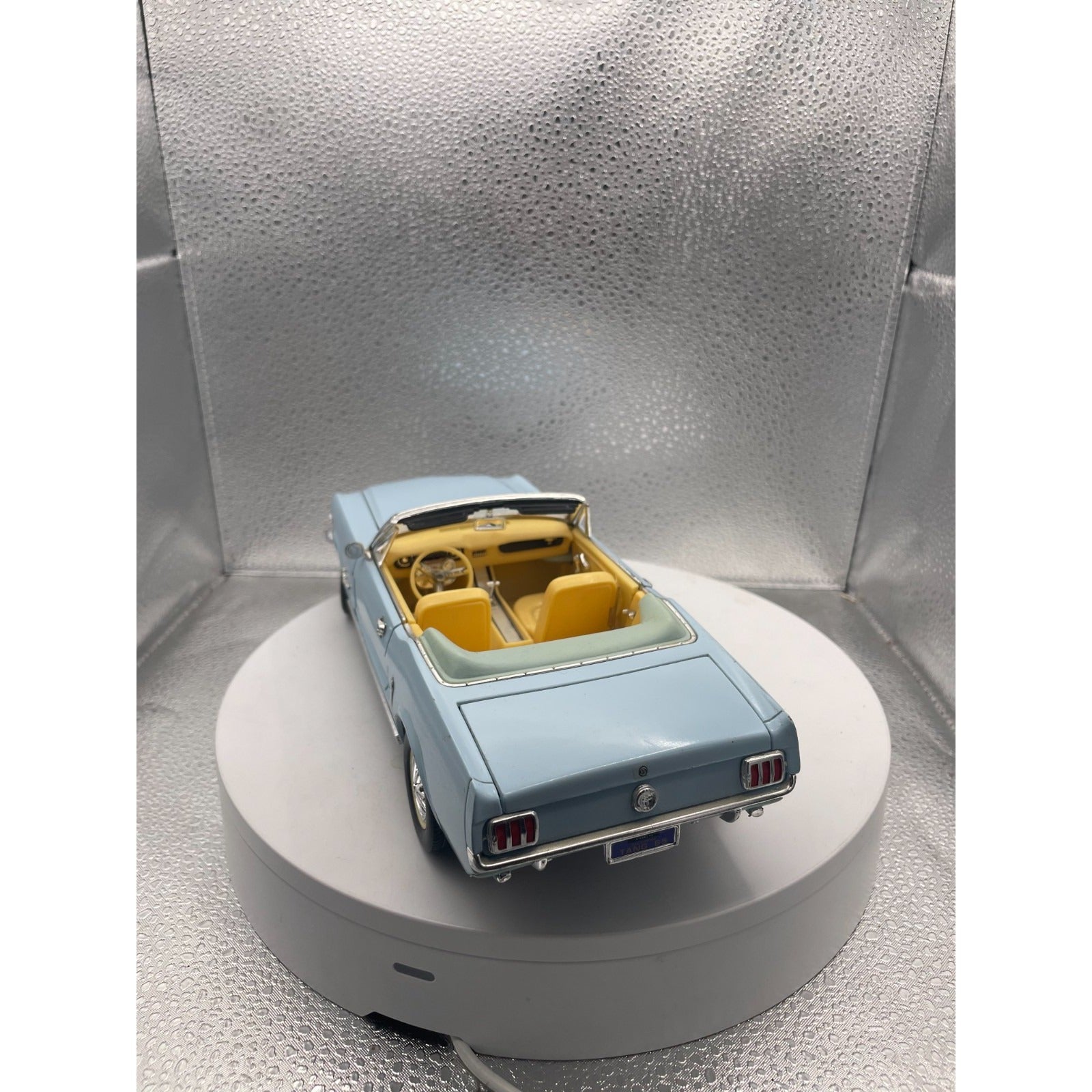 MIRA 1965 Ford Mustang Light Blue Convertible Die Cast, Scale: 1/18 back end/trunk view