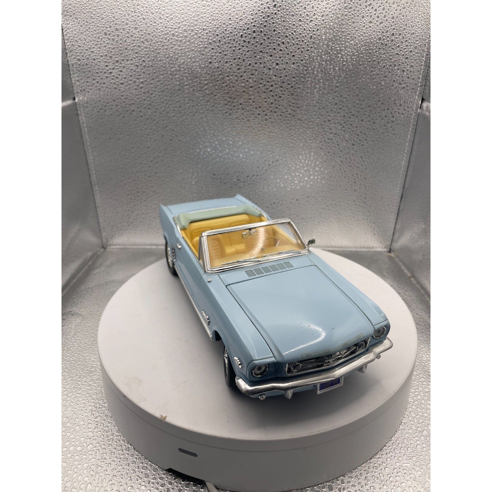 MIRA 1965 Ford Mustang Light Blue Convertible Die Cast, Scale: 1/18 passenger side/front end view