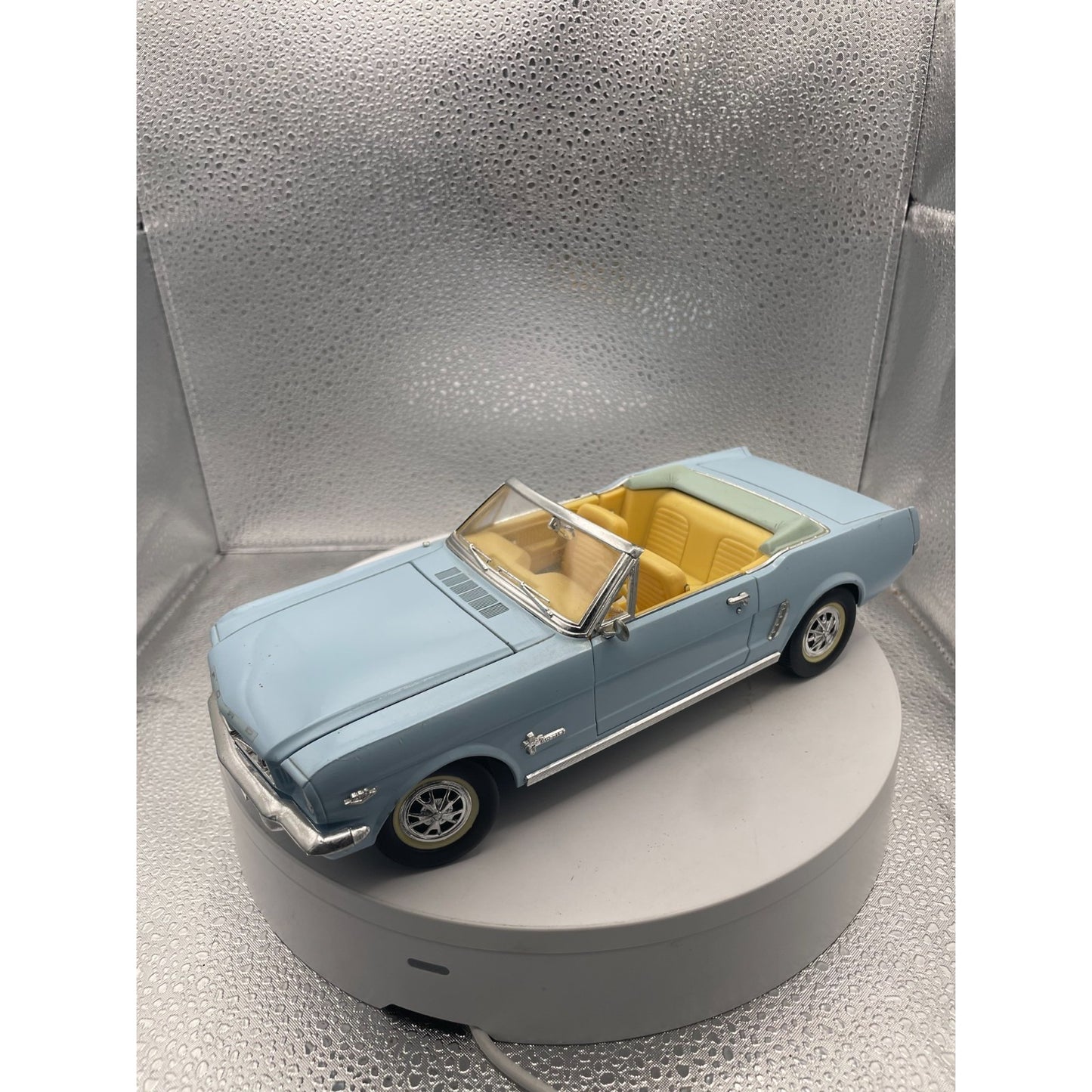 MIRA 1965 Ford Mustang Light Blue Convertible Die Cast, Scale: 1/18 front end/drivers side view