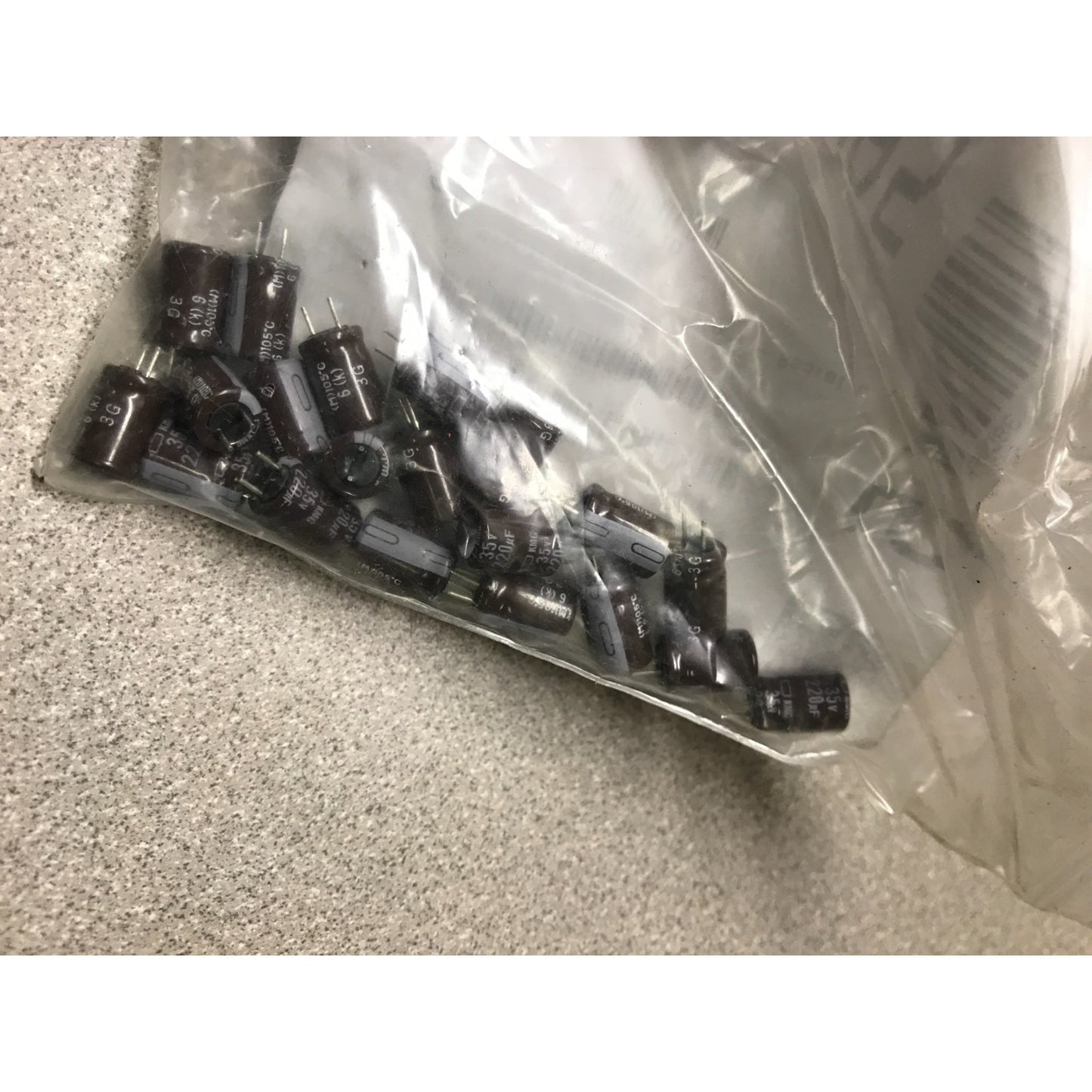 220UF 35V UCC Aluminum Electrolytic Capacitors - Radial Leaded capacitors in clear plastic bag
