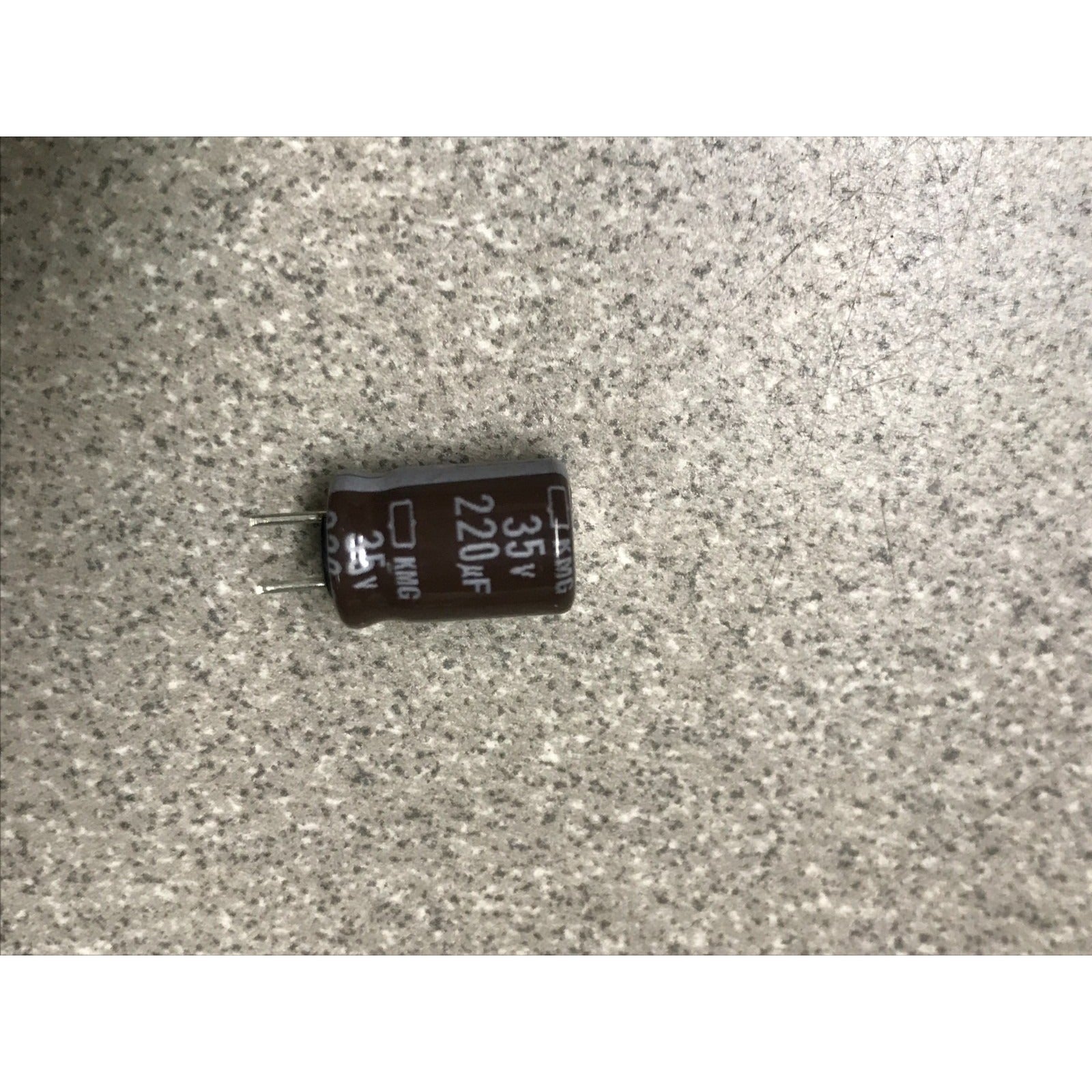 220UF 35V UCC Aluminum Electrolytic Capacitors - Radial Leaded closeup of capacitor