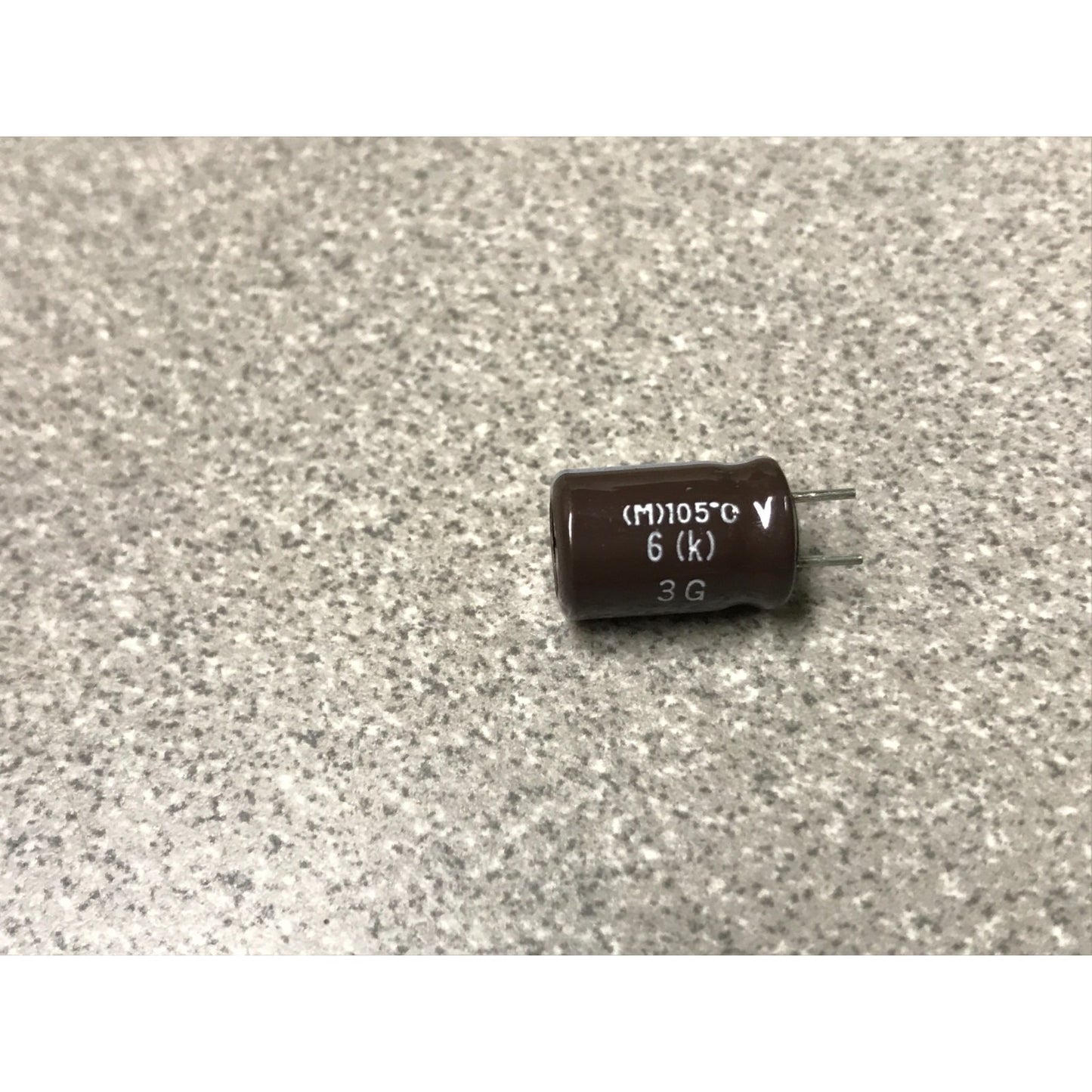 220UF 35V UCC Aluminum Electrolytic Capacitors - Radial Leaded closeup of capacitor