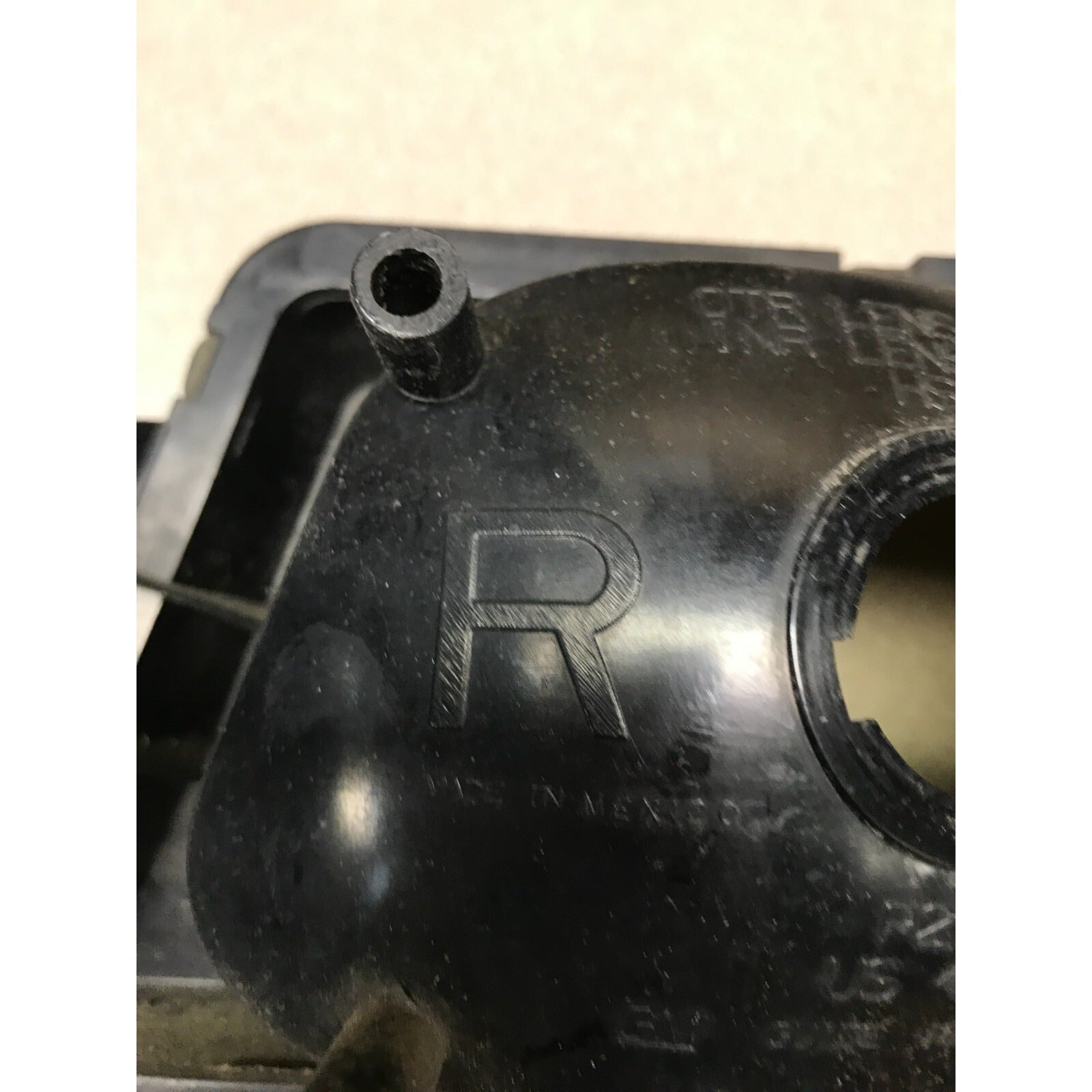 GM P27/7W Right Headlight Bottom Lense, Fits 2003 Chevy Silverado 2500HD back view side stamp