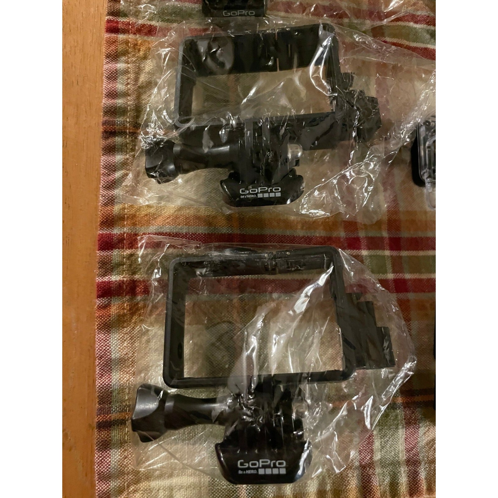 GoPro Hero 3, 3+, 4 Cases - Lot of 9, Various Cases closeup in packaging