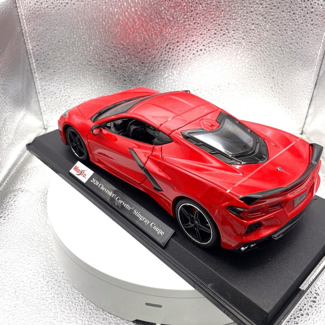 Maisto 2020 Chevrolet Corvette Stingray Coupe Red Die Cast with Base, Scale: 1/18 driver's side/rear view
