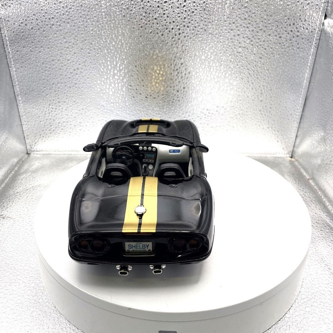 Maisto 1999 Shelby Series 1 Black and Gold Die Cast, 1/18 Scale rear view