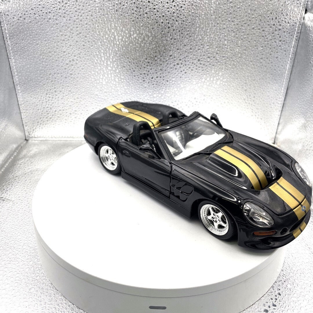 Maisto 1999 Shelby Series 1 Black and Gold Die Cast, 1/18 Scale passenger/front view