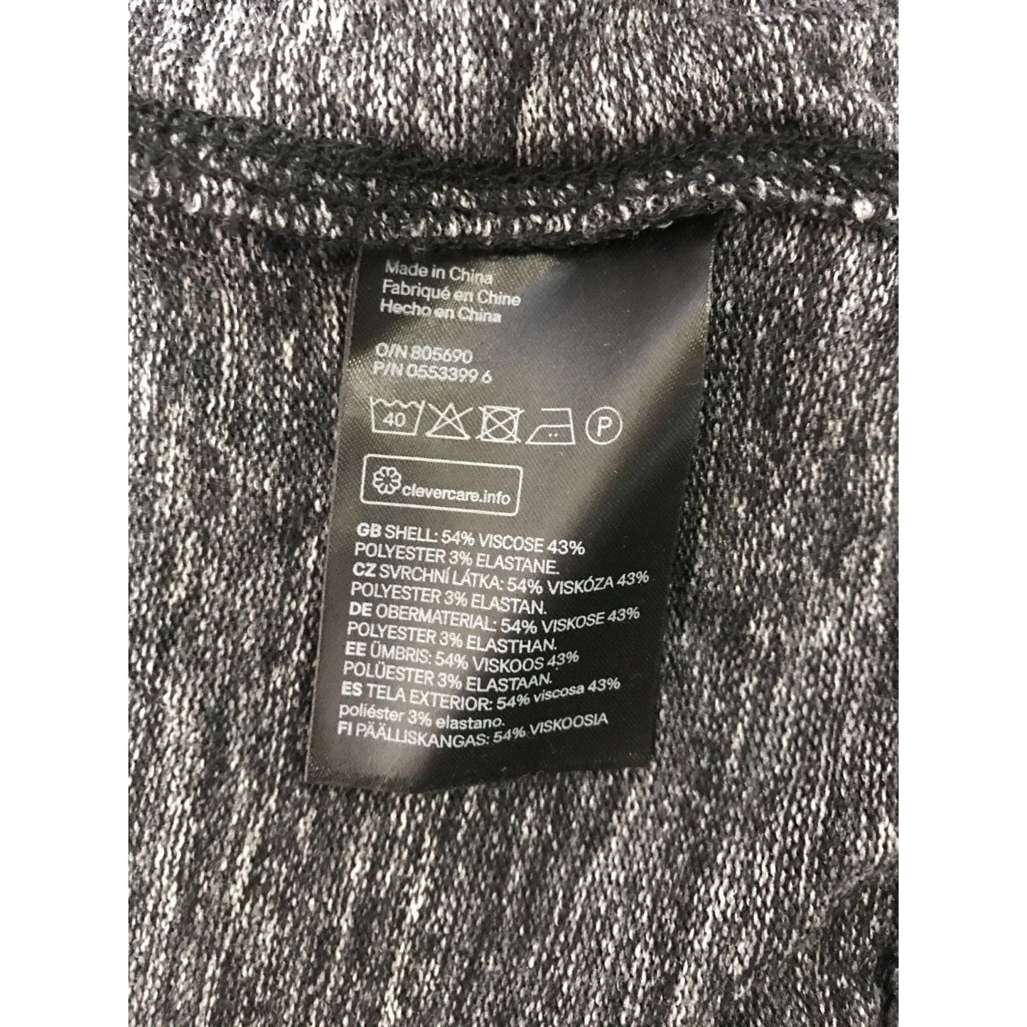 H&M L.O.G.G. Small Thin Zip-Up Hooded Sweater Care label closeup