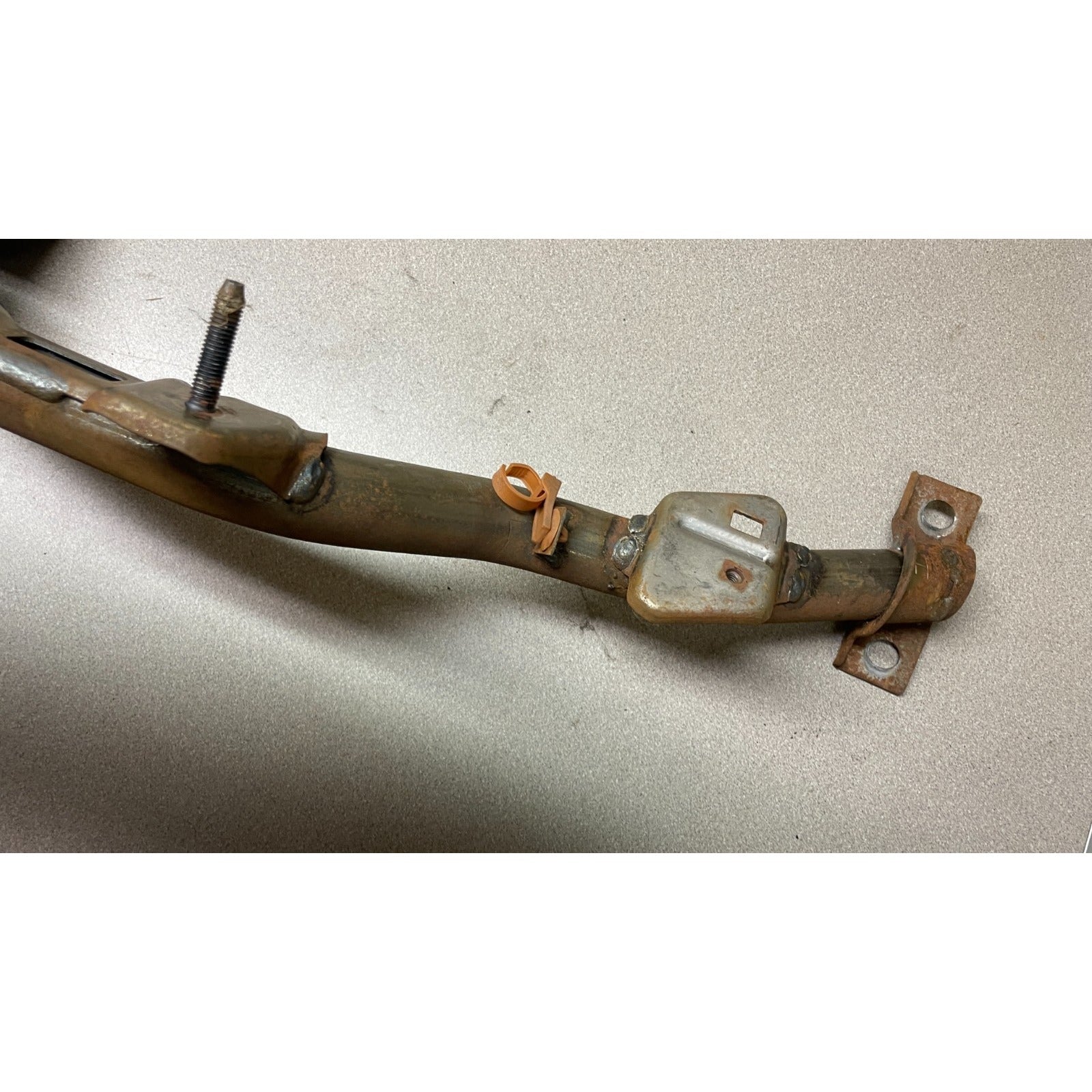 OEM Honda Del Sol Under Dash Dasboard Metal Support Frame Brace Bar closeup of end with backet