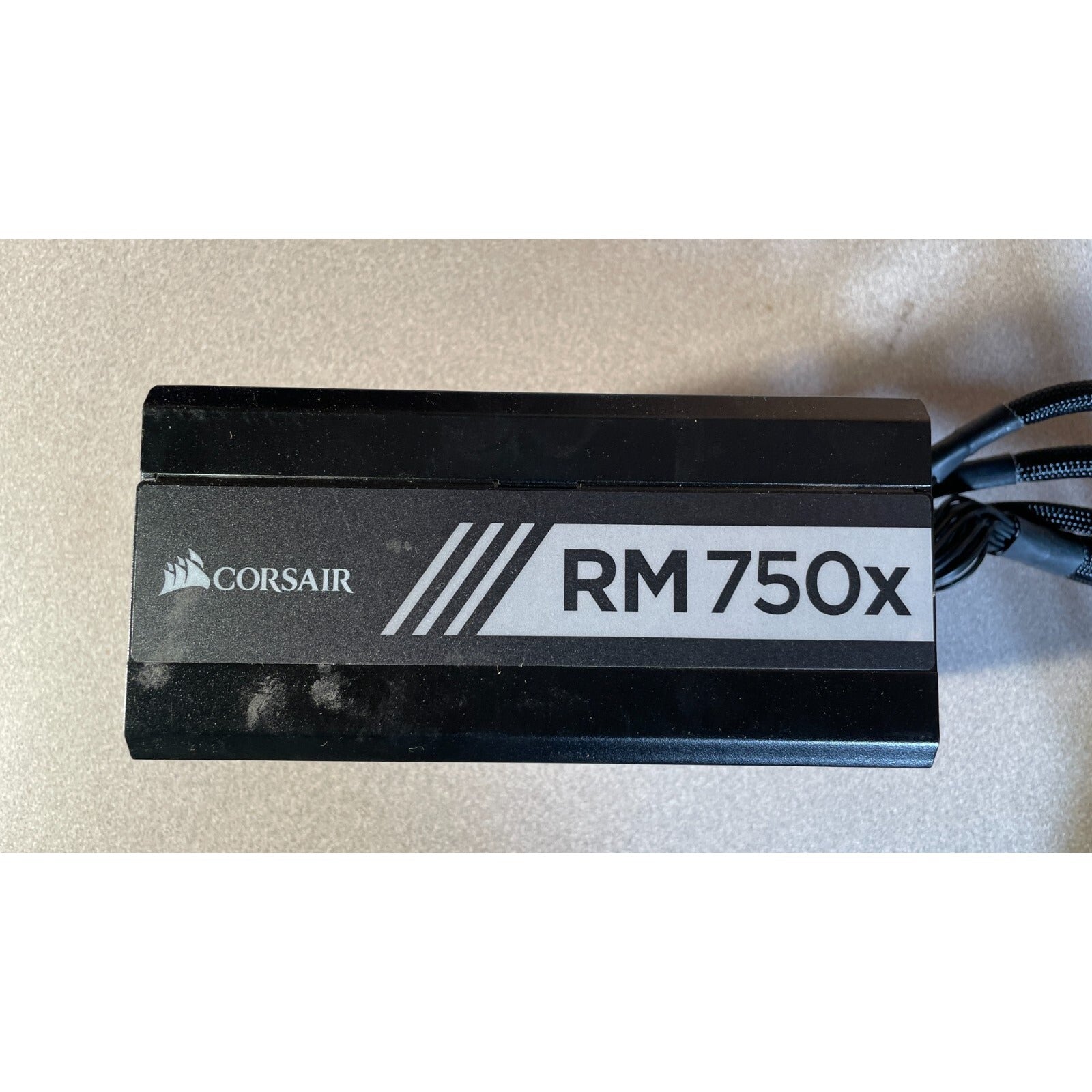 Corsair RM750x Model RPS0016 Power Supply top view with model number
