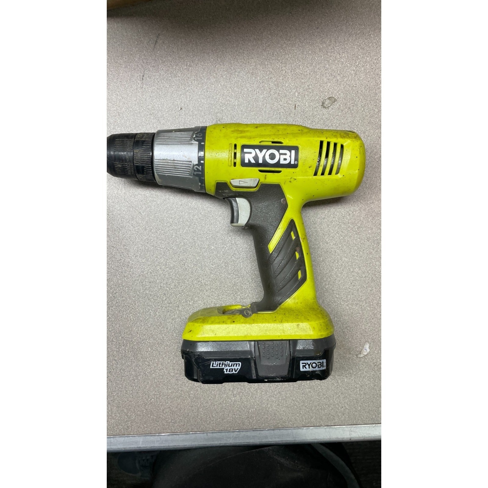 Ryobi P205G 18V 3/8 in drill side view with product logo