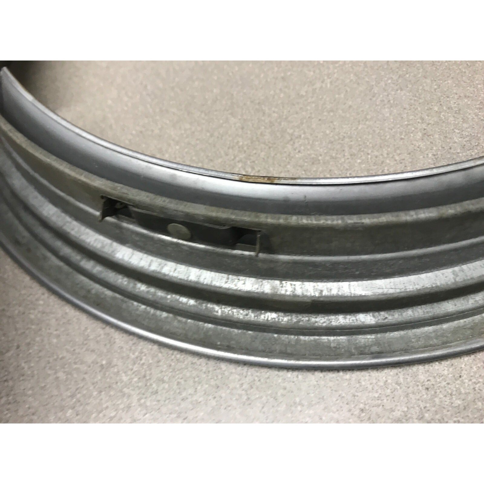 Lot 4 Unmatching 1966 Pontiac GTO OEM Wheel Trim Rings side of rim close up