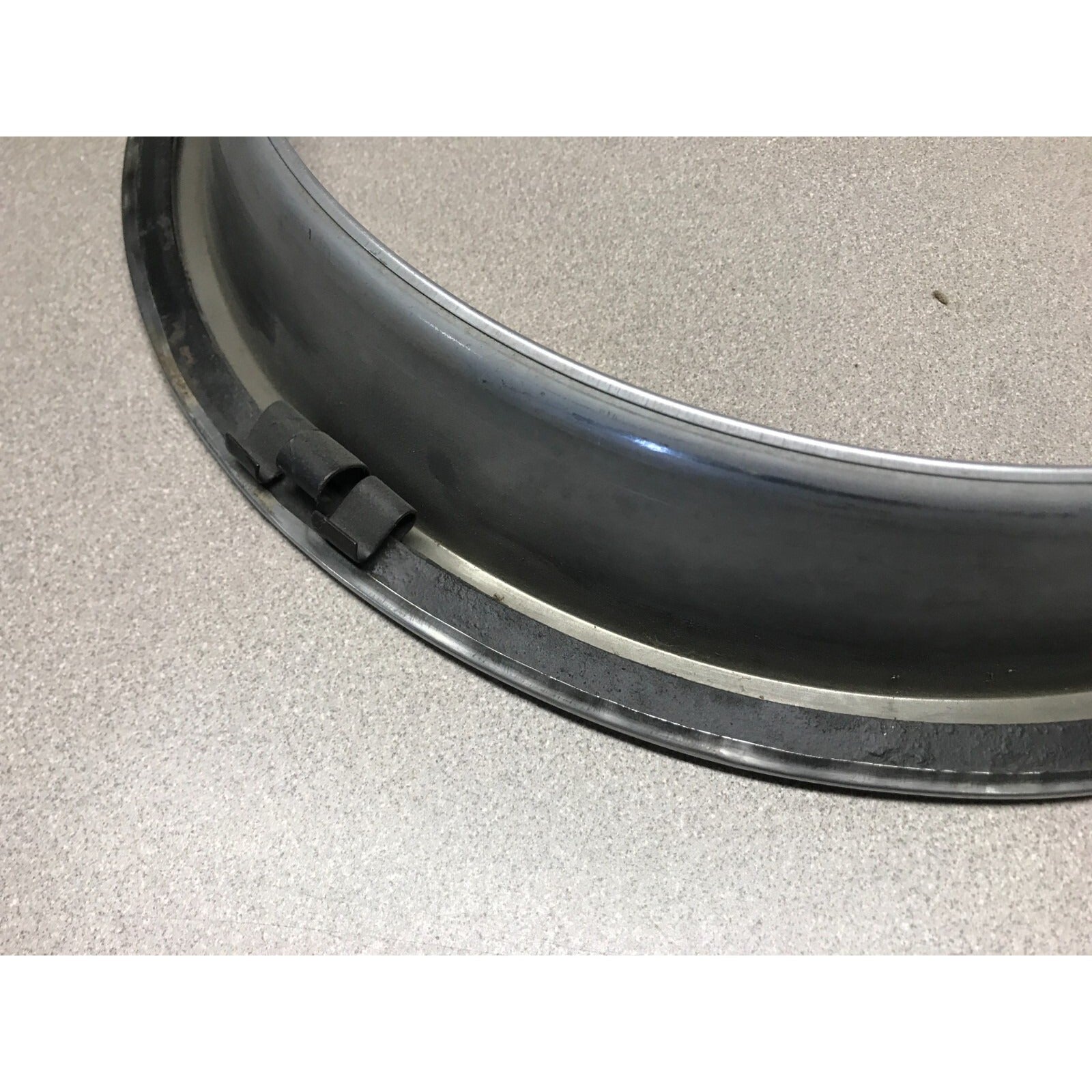 Lot 4 Unmatching 1966 Pontiac GTO OEM Wheel Trim Rings close up