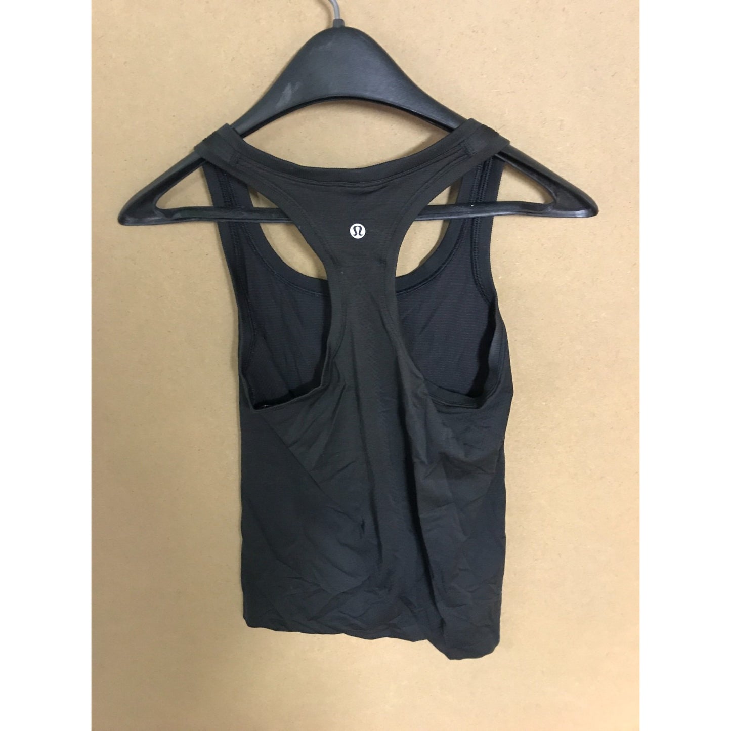 Lululemon Black Athletic Racerback Sleeveless Tank-top back of top on hanger show logo