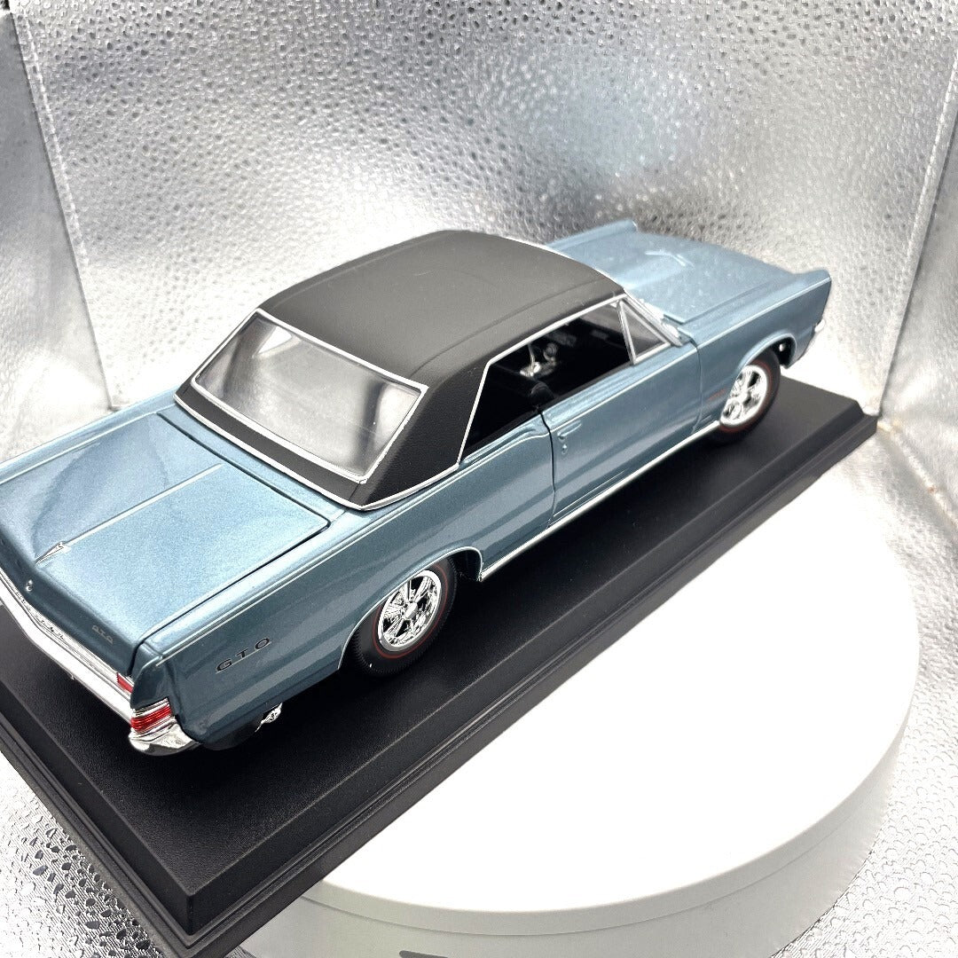 Maisto 1965 Pontiac GTO Blue Die Cast with Base, Scale: 1/18 rear/passenger side view