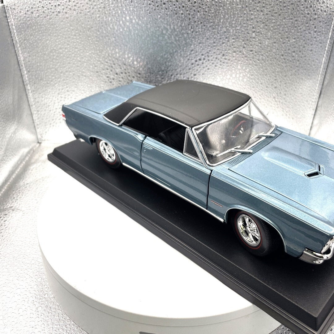 Maisto 1965 Pontiac GTO Blue Die Cast with Base, Scale: 1/18 passenger side/front view