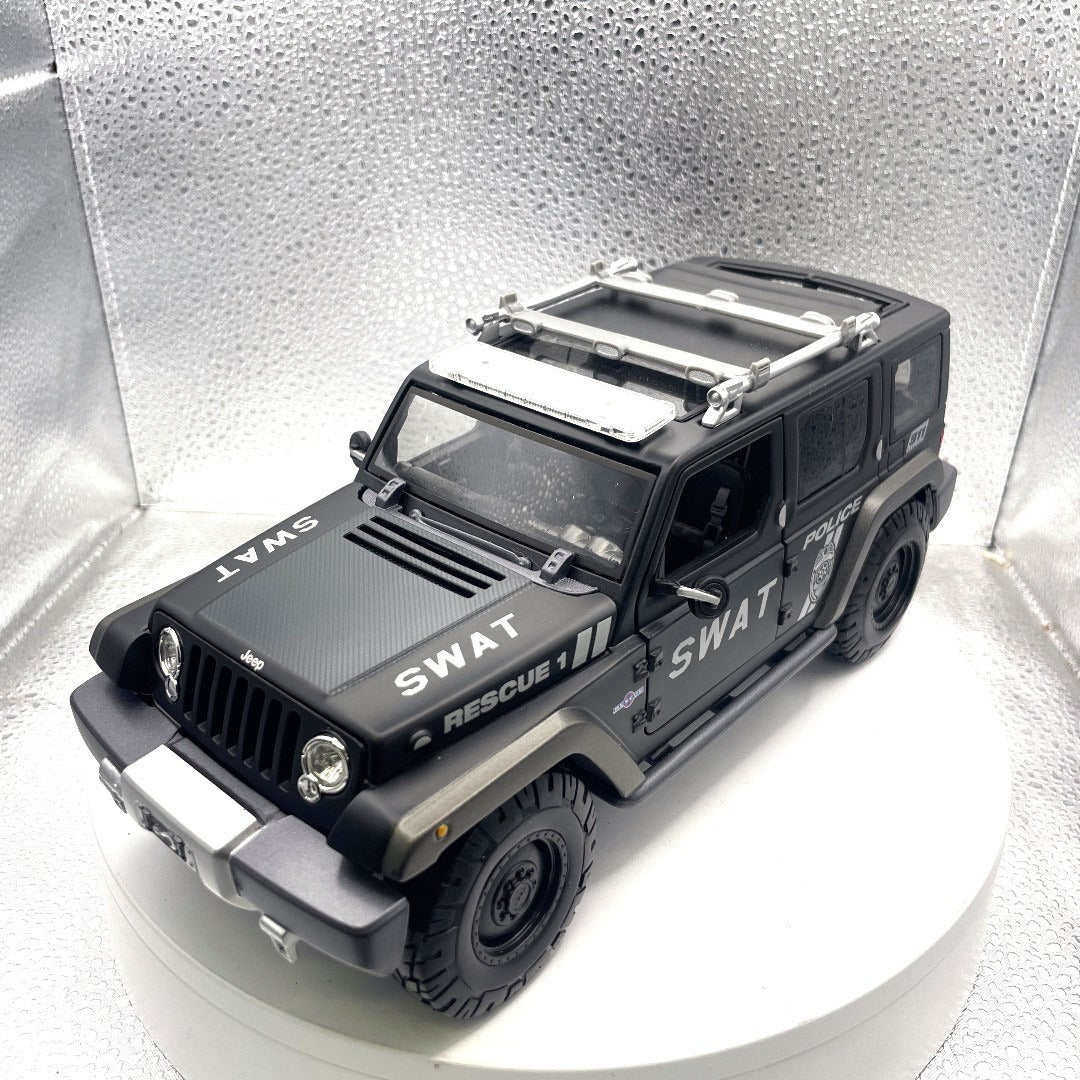 Maisto Jeep Rescue Concept SWAT Black Die Cast, Scale: 1/18, 11532 front end/drivers side view
