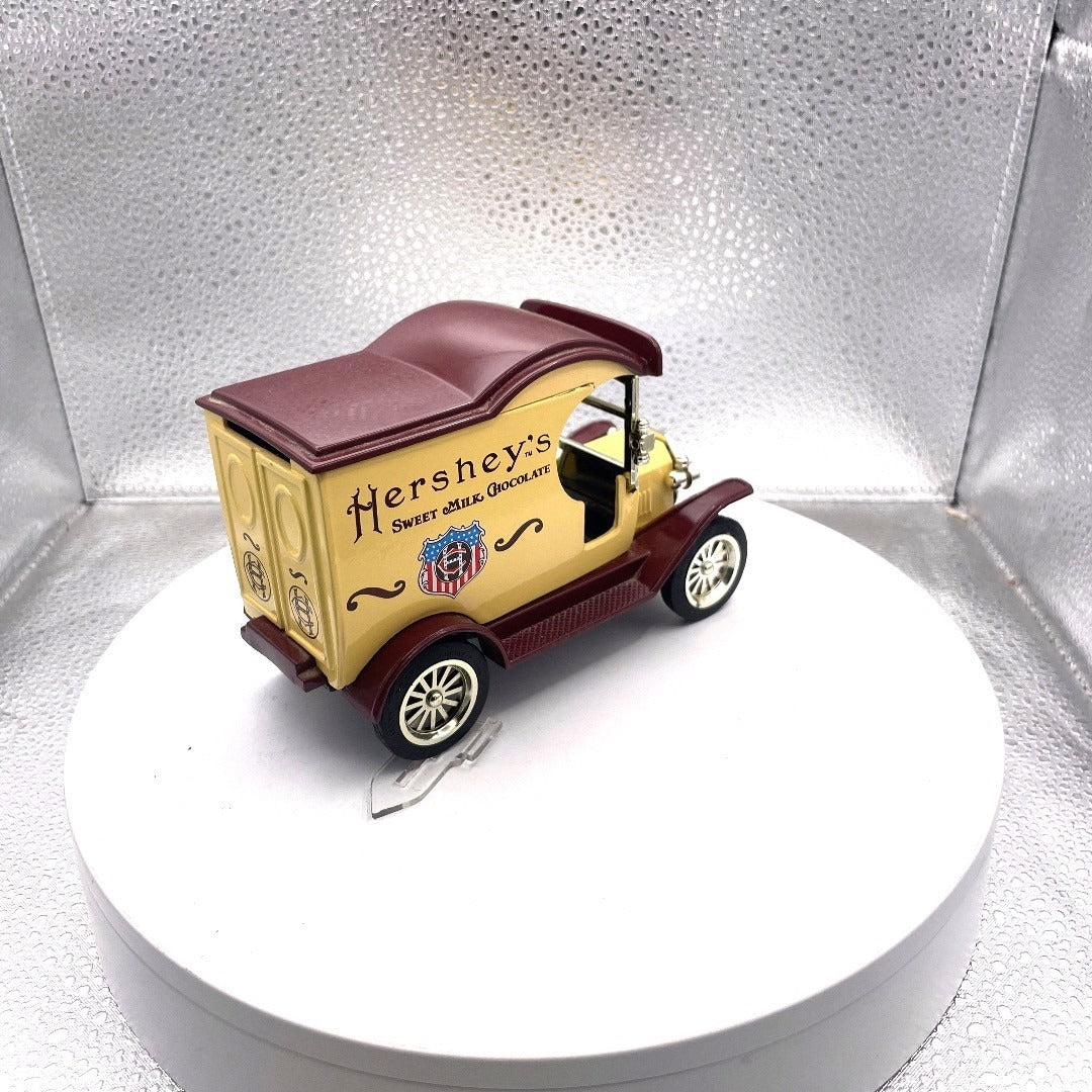 Gearbox Toy Replica 1912 Delivery Car Ford Model T Coin Bank, Hershey's Sweet Milk Chocolate
 back end/passenger side view