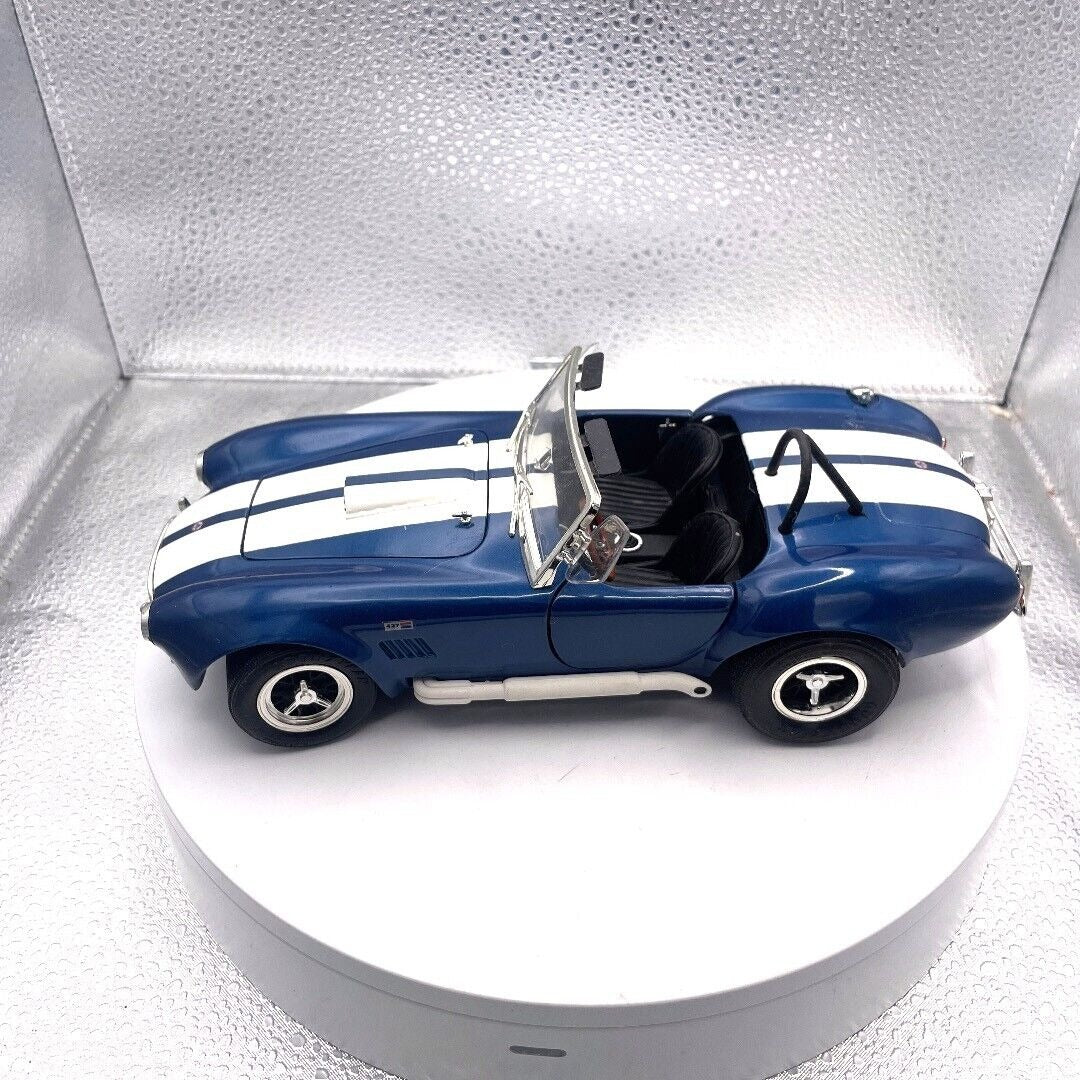 ERTL Shelby Cobra 437 Blue and White Stripe Die Cast, Scale 1/18 driver's side view