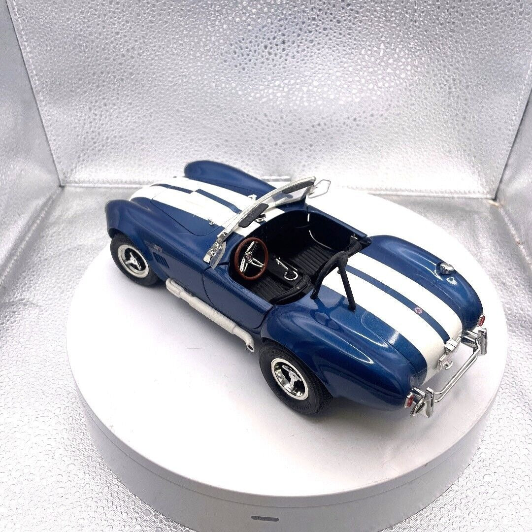 ERTL Shelby Cobra 437 Blue and White Stripe Die Cast, Scale 1/18 driver's side/rear view