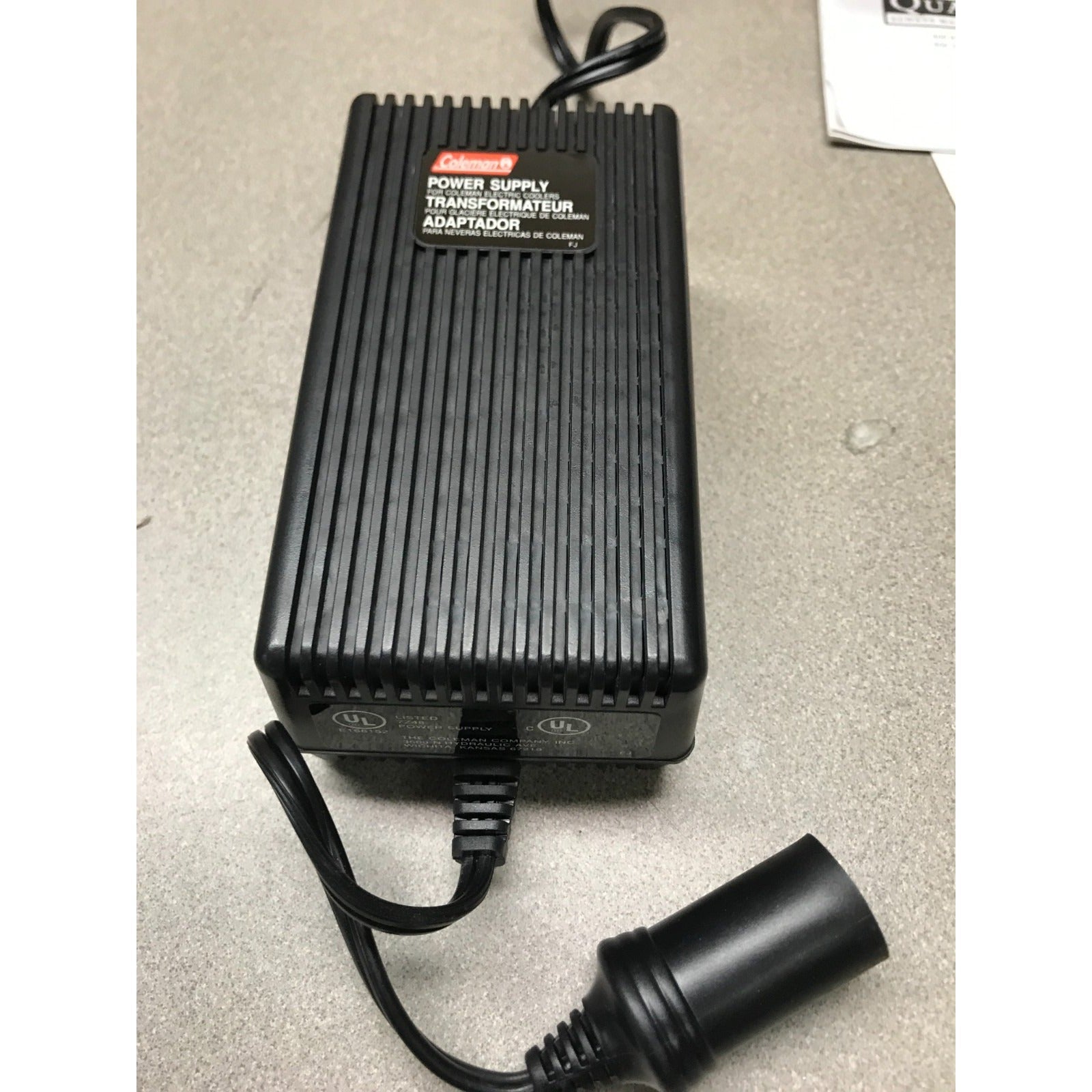 Coleman 120-V AC Adaptor, Converts to 12 Volts DC (5.25 amps), 5232E640T closeup of power supply