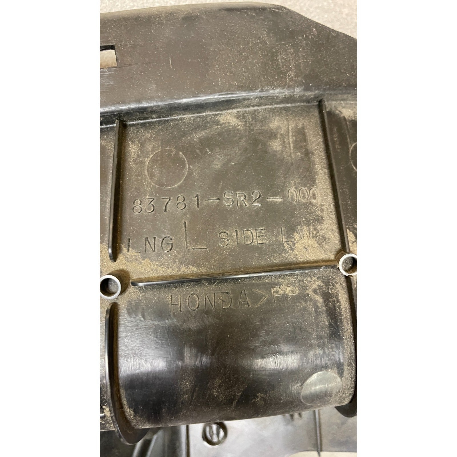 OEM Honda Civic Del Sol Driver Lower Left Rear Interior Cover Trim Panel OEM back side closeup of product information stamp