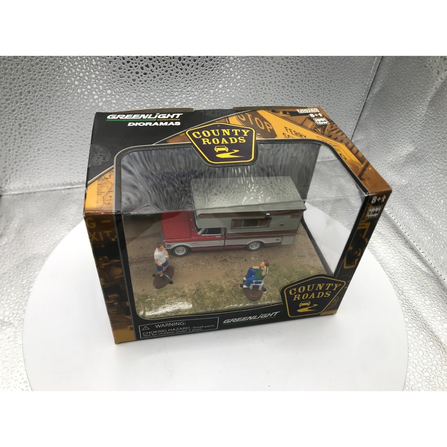 Greenlight Diorama Series 2 County Roads top of package view displaying camper contents