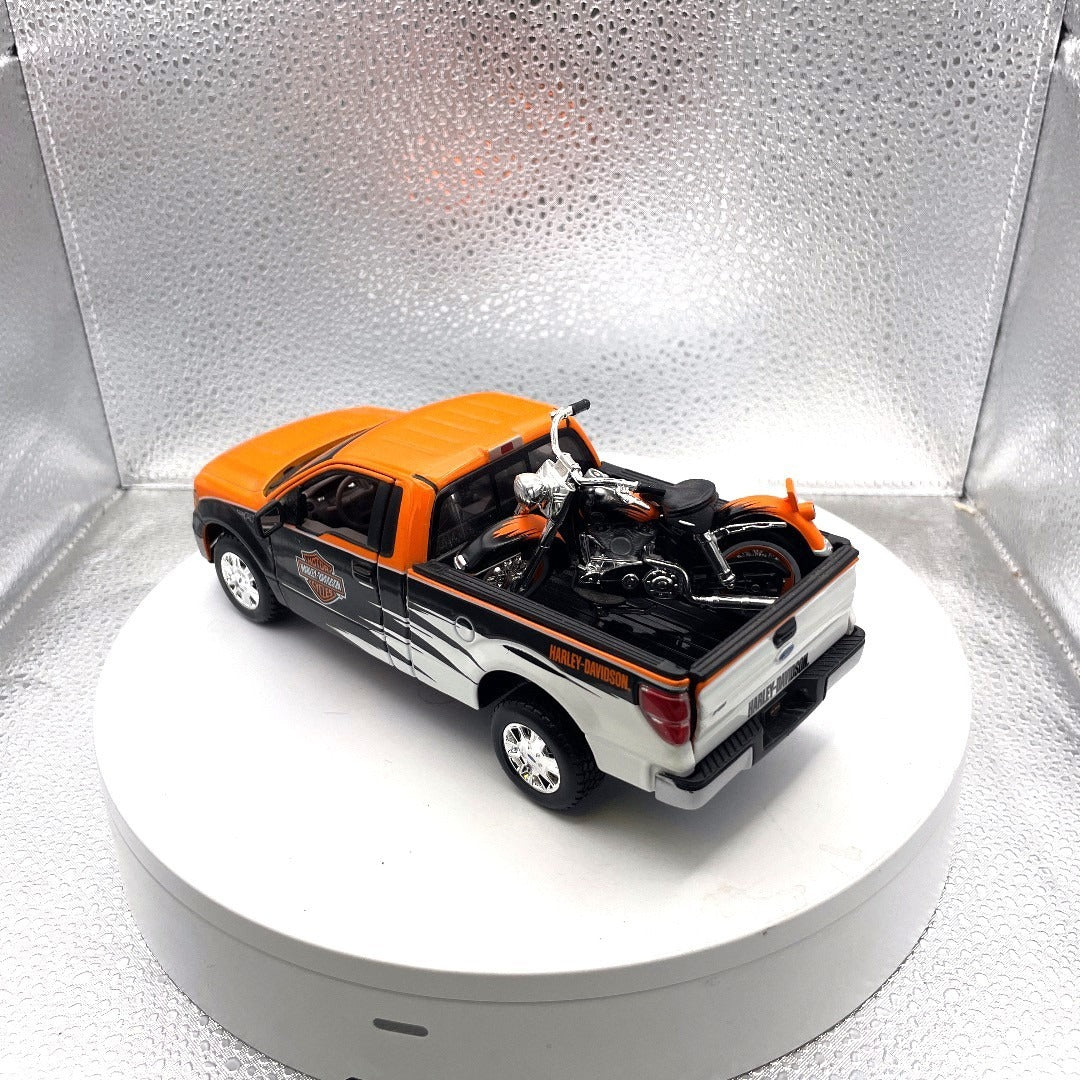 Maisto 2010 Ford F-150 STX Harley Davidson Die Cast with Motorcycle, Scale: 1/27, No. 01618 drivers side/back end view