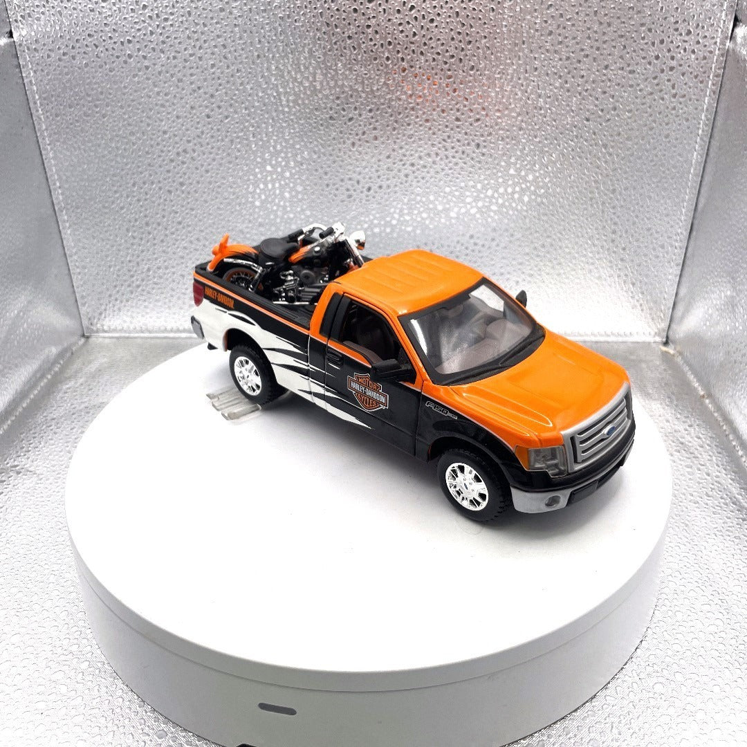 Maisto 2010 Ford F-150 STX Harley Davidson Die Cast with Motorcycle, Scale: 1/27, No. 01618 passenger side/front end view