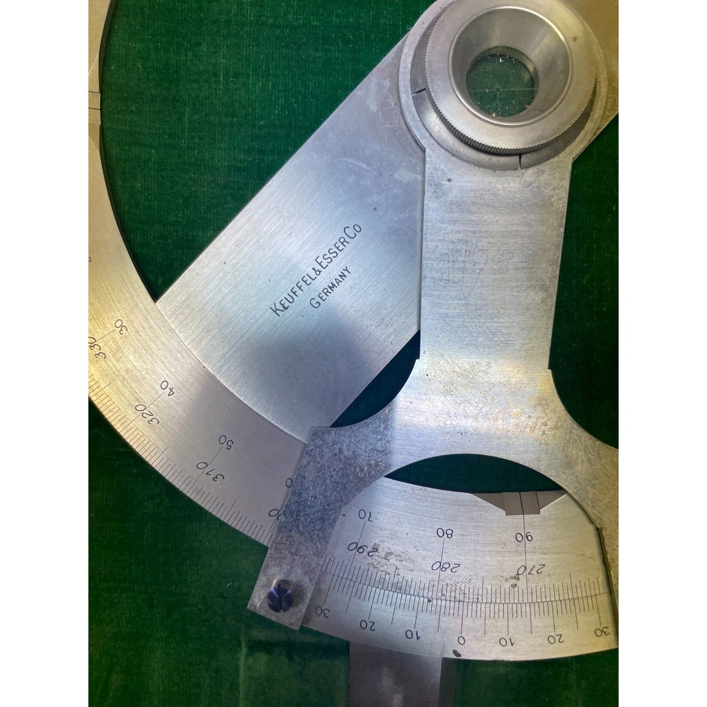 Keuffel &amp; Esser Co. 1221 1/2 8 Inch Protractor Drafting Tool with Case, Made in Germany close up of manufacturers stamp