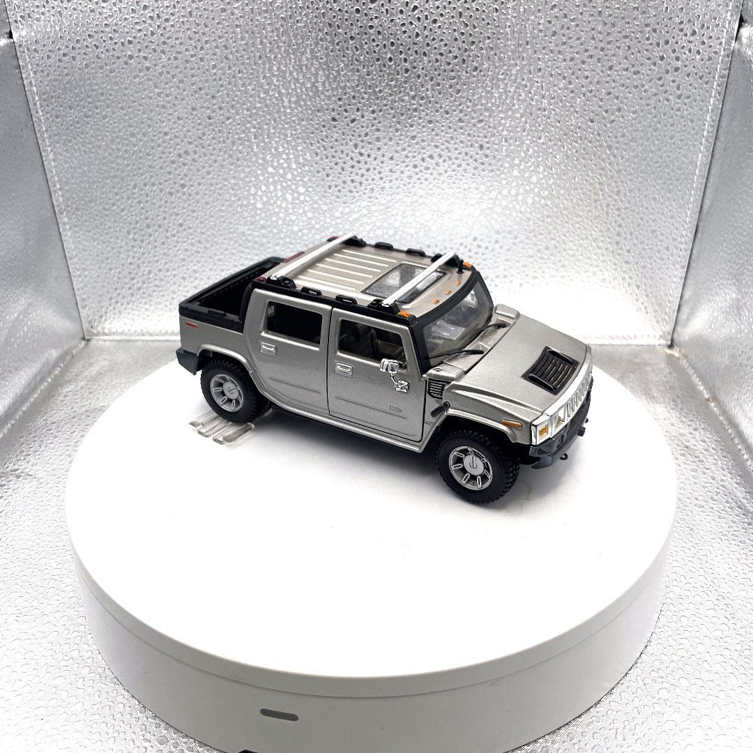 Maisto Hummer H2 Silver Die Cast, Scale: 1/27 passenger side/front end view