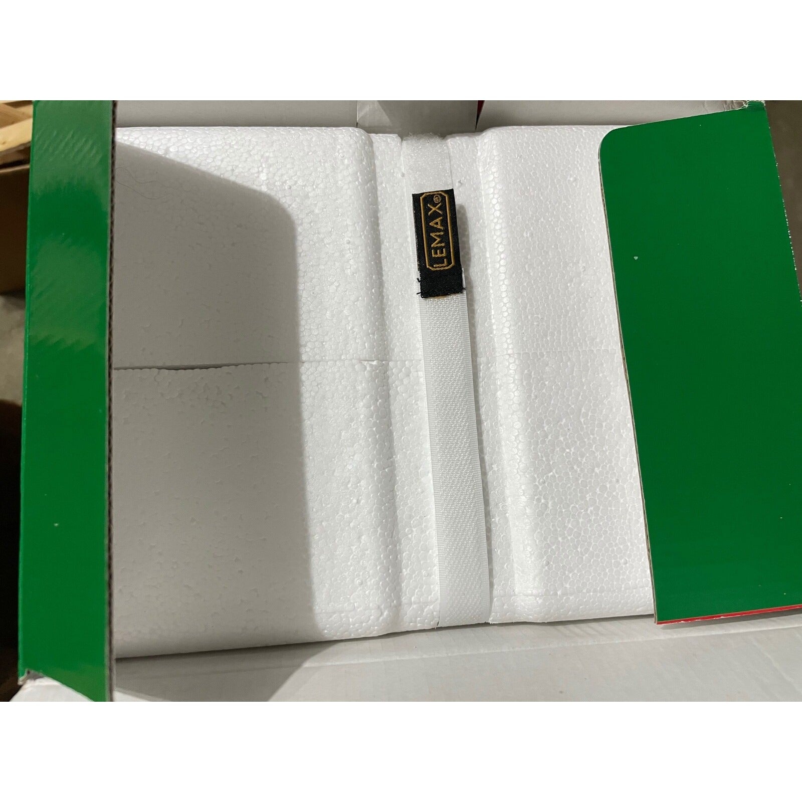 Foam block with a LEMAX label on a white background